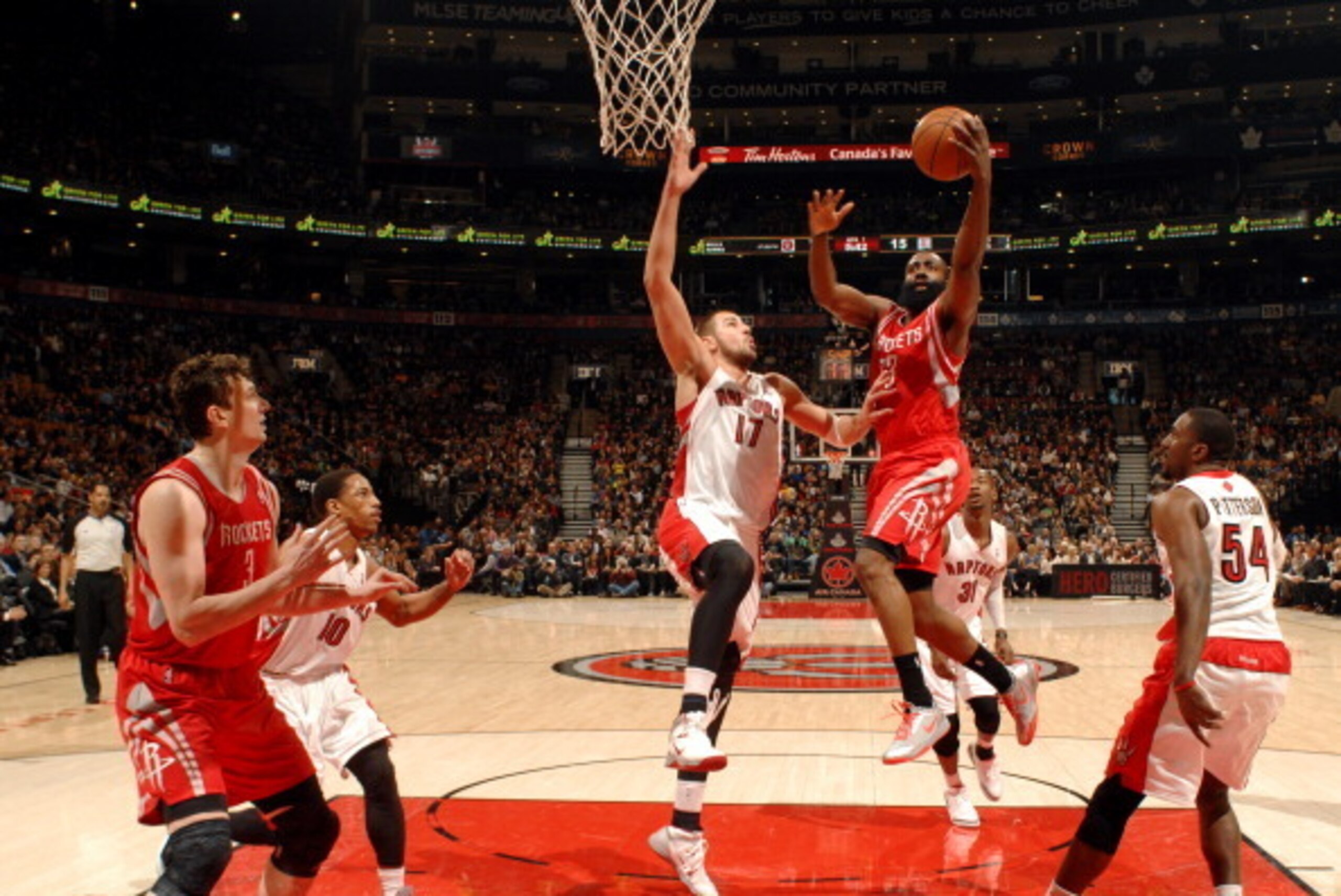 TORONTO, CANADA - April 2: James Harden #13 of the Houston Rockets shoots against the Toronto Raptors on April 2, 2014 at the Air Canada Centre in Toronto, Ontario, Canada. NOTE TO USER: User expressly acknowledges and agrees that, by downloading and or TORONTO, CANADA - April 2: James Harden #13 of the Houston Rockets shoots against the Toronto Raptors on April 2, 2014 at the Air Canada Centre in Toronto, Ontario, Canada. NOTE TO USER: User expressly acknowledges and agrees that, by downloading and or