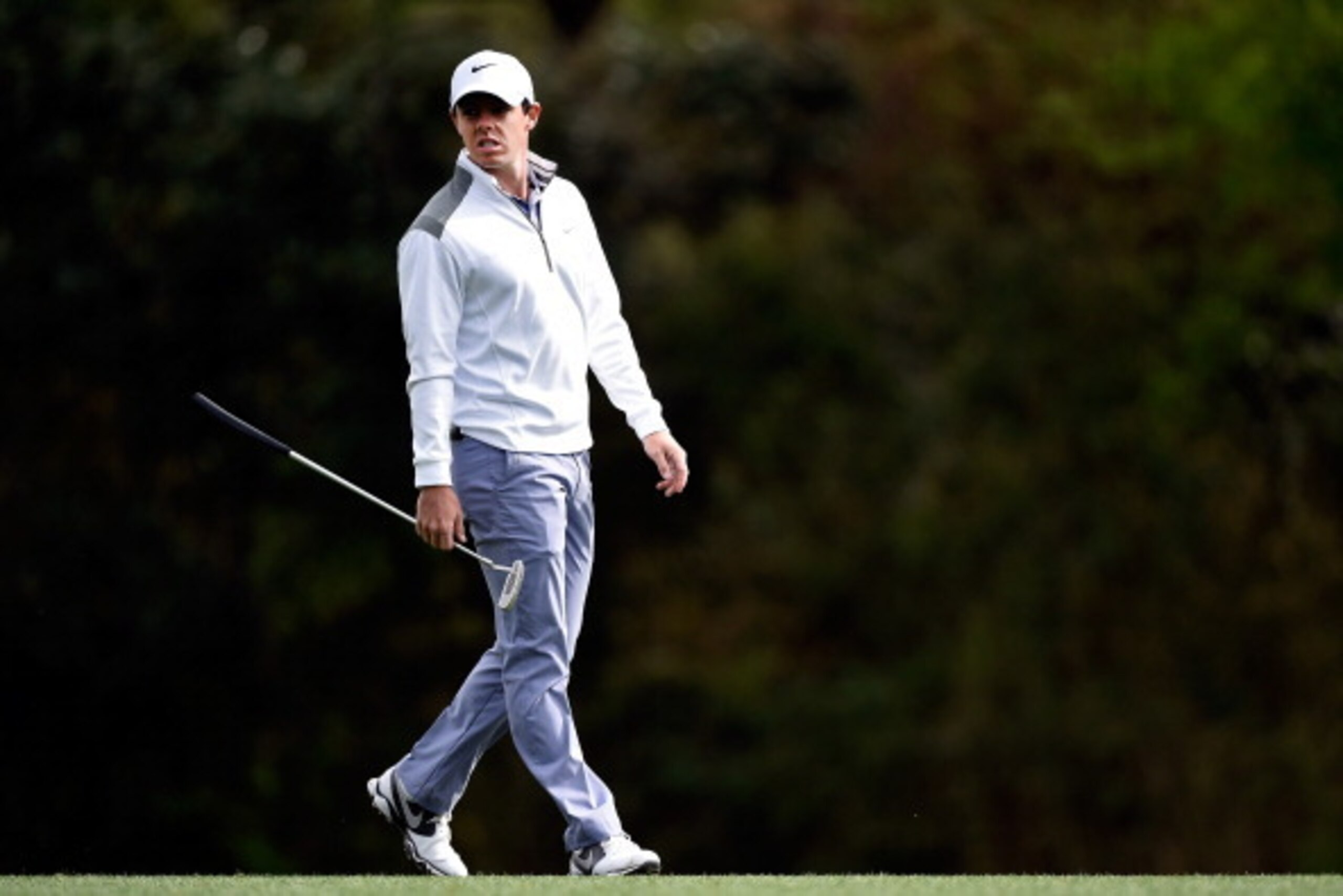 AUGUSTA, GA - APRIL 08:  Rory McIlroy of Northern Ireland walks across a green during a practice round prior to the start of the 2014 Masters Tournament at Augusta National Golf Club on April 8, 2014 in Augusta, Georgia.  (Photo by Harry How/Getty Images)