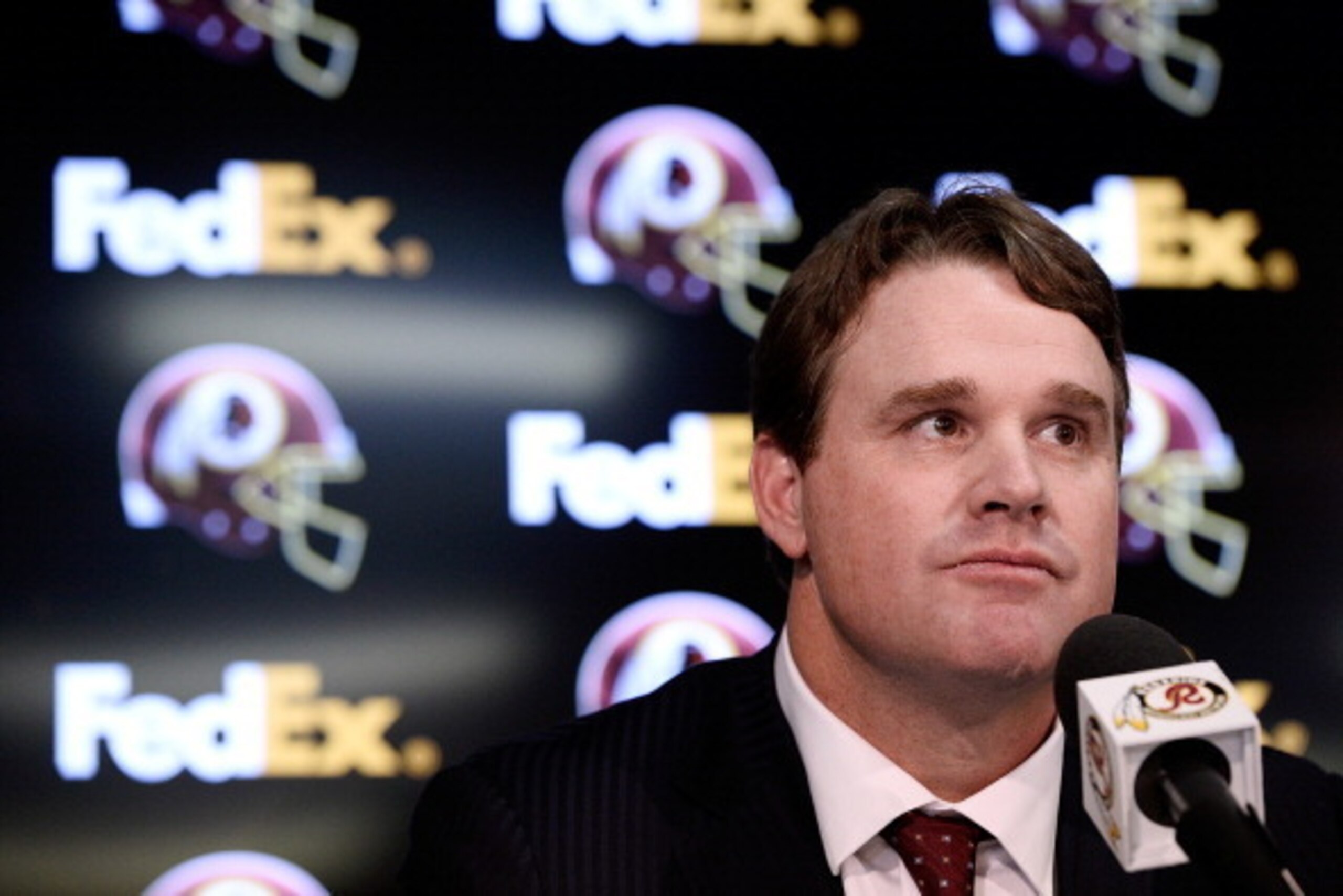 ASHBURN, VA - JANUARY 09:  Jay Gruden speaks as he is introduced as the new head coach of the Washington Redskins at a press conference at Redskins Park on January 9, 2014 in Ashburn, Virginia.  (Photo by Patrick McDermott/Getty Images)