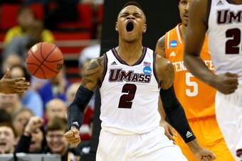 RALEIGH, NC - MARCH 21:  Derrick Gordon #2 of the Massachusetts Minutemen reacts while taking on the Tennessee Volunteers in the second round of the 2014 NCAA Men's Basketball Tournament at PNC Arena on March 21, 2014 in Raleigh, North Carolina.  (Photo b
