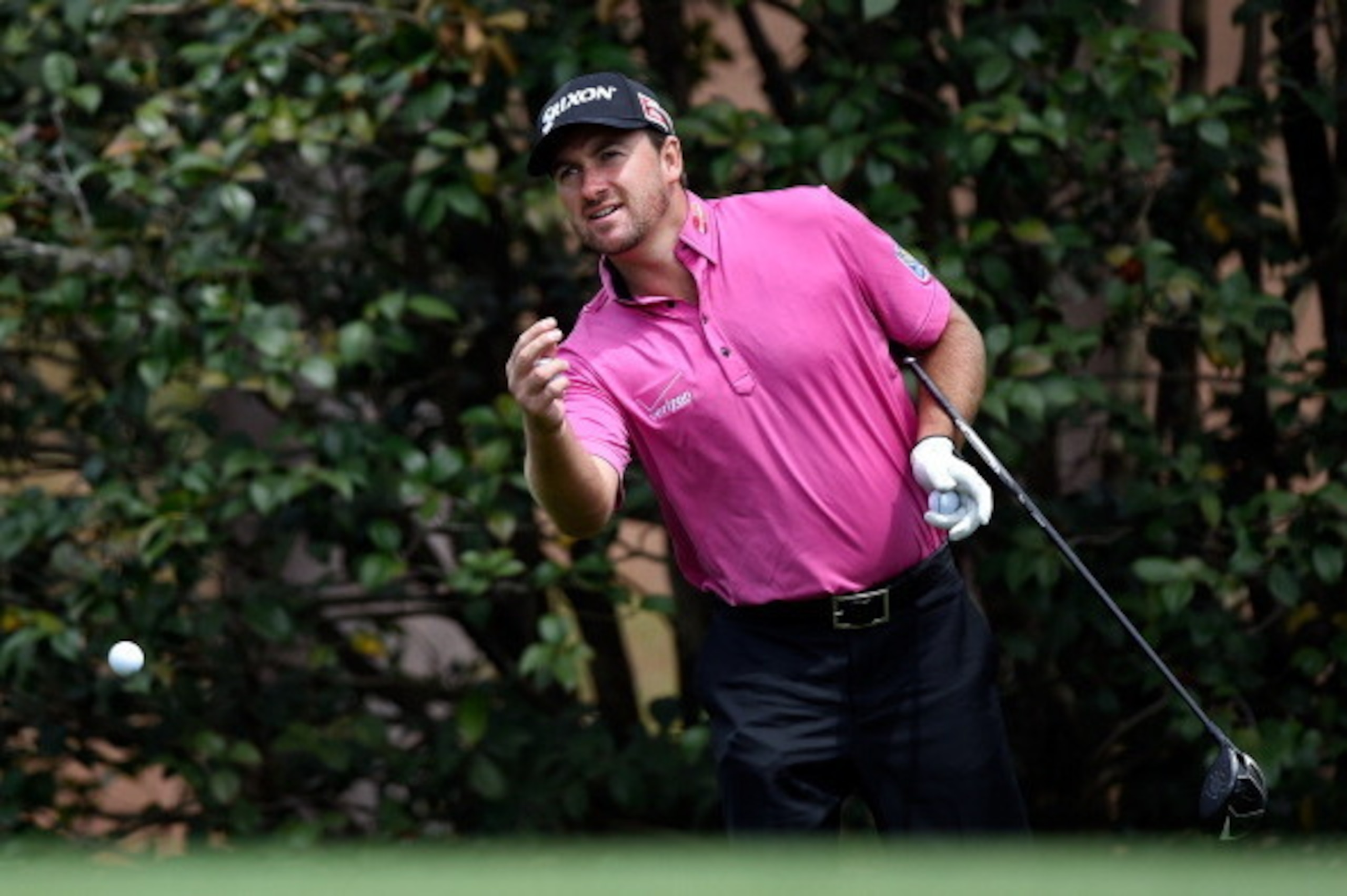 AUGUSTA, GA - APRIL 08:  Graeme McDowell of Northern Ireland tosses a golf ball during a practice round prior to the start of the 2014 Masters Tournament at Augusta National Golf Club on April 8, 2014 in Augusta, Georgia.  (Photo by Harry How/Getty Images
