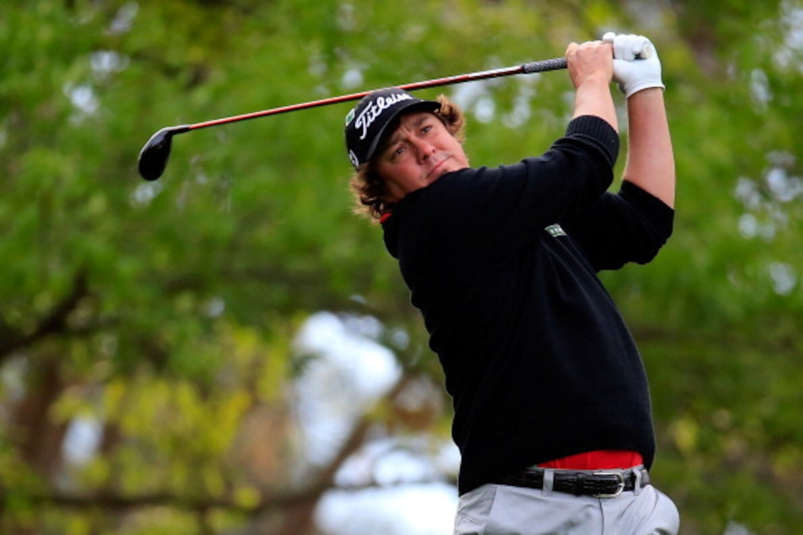 AUGUSTA, GA - APRIL 08:  Jason Dufner of the United States hits a shot during a practice round prior to the start of the 2014 Masters Tournament at Augusta National Golf Club on April 8, 2014 in Augusta, Georgia.  (Photo by Rob Carr/Getty Images)