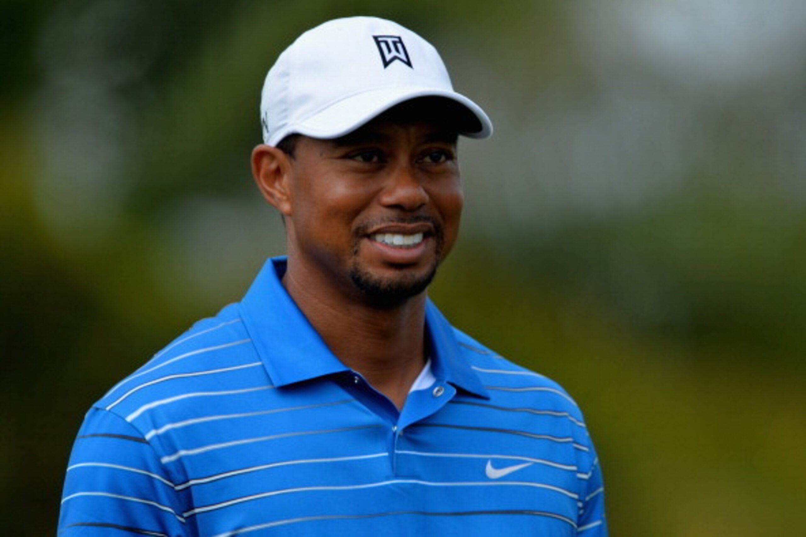 PALM BEACH GARDENS, FL - FEBRUARY 27:  Tiger Woods looks on during the first round of The Honda Classic at PGA National Resort and Spa on February 27, 2014 in Palm Beach Gardens, Florida.  (Photo by Stuart Franklin/Getty Images)