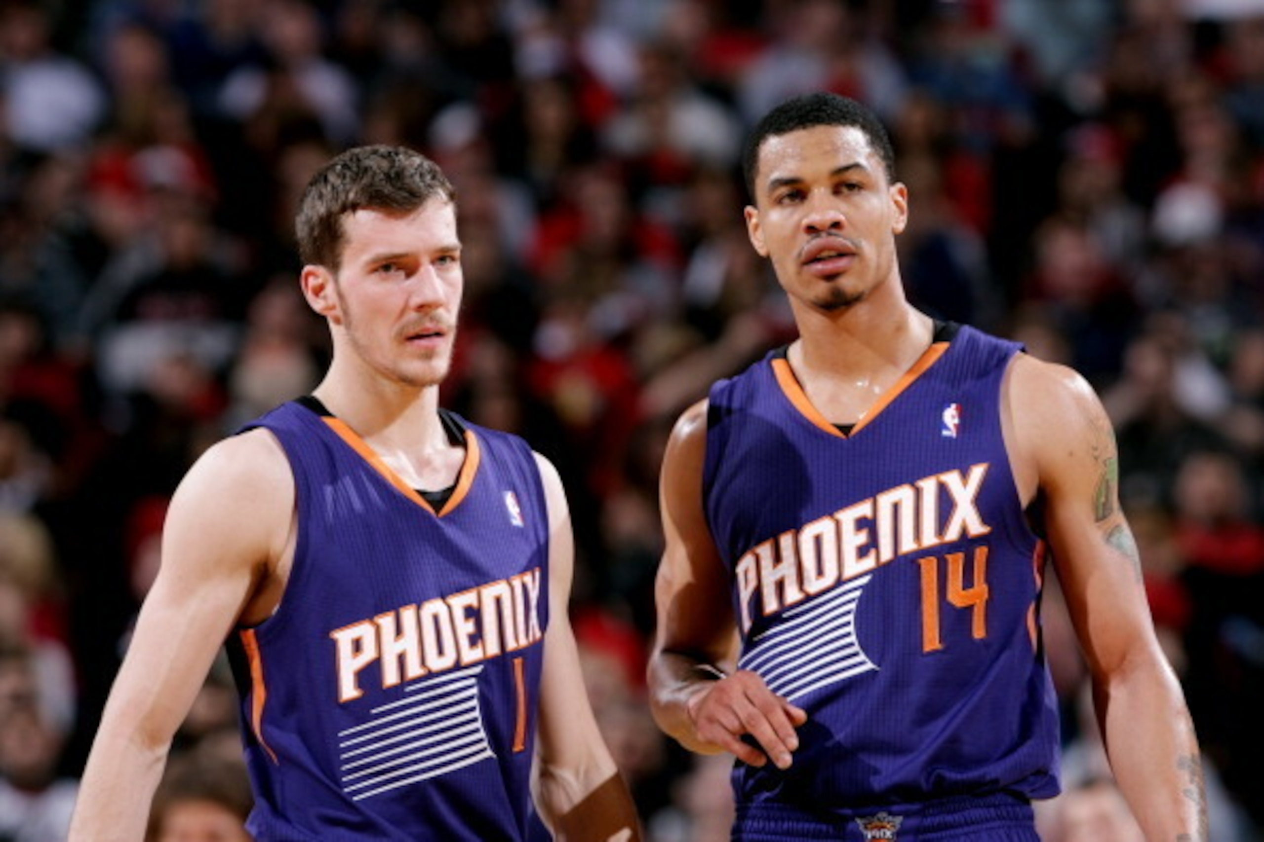 PORTLAND, OR - APRIL 4: Goran Dragic #1 and Gerald Green #14 of the Phoenix Suns stand on the court during a game against the Portland Trail Blazers on April 4, 2014 at the Moda Center Arena in Portland, Oregon. NOTE TO USER: User expressly acknowledges a