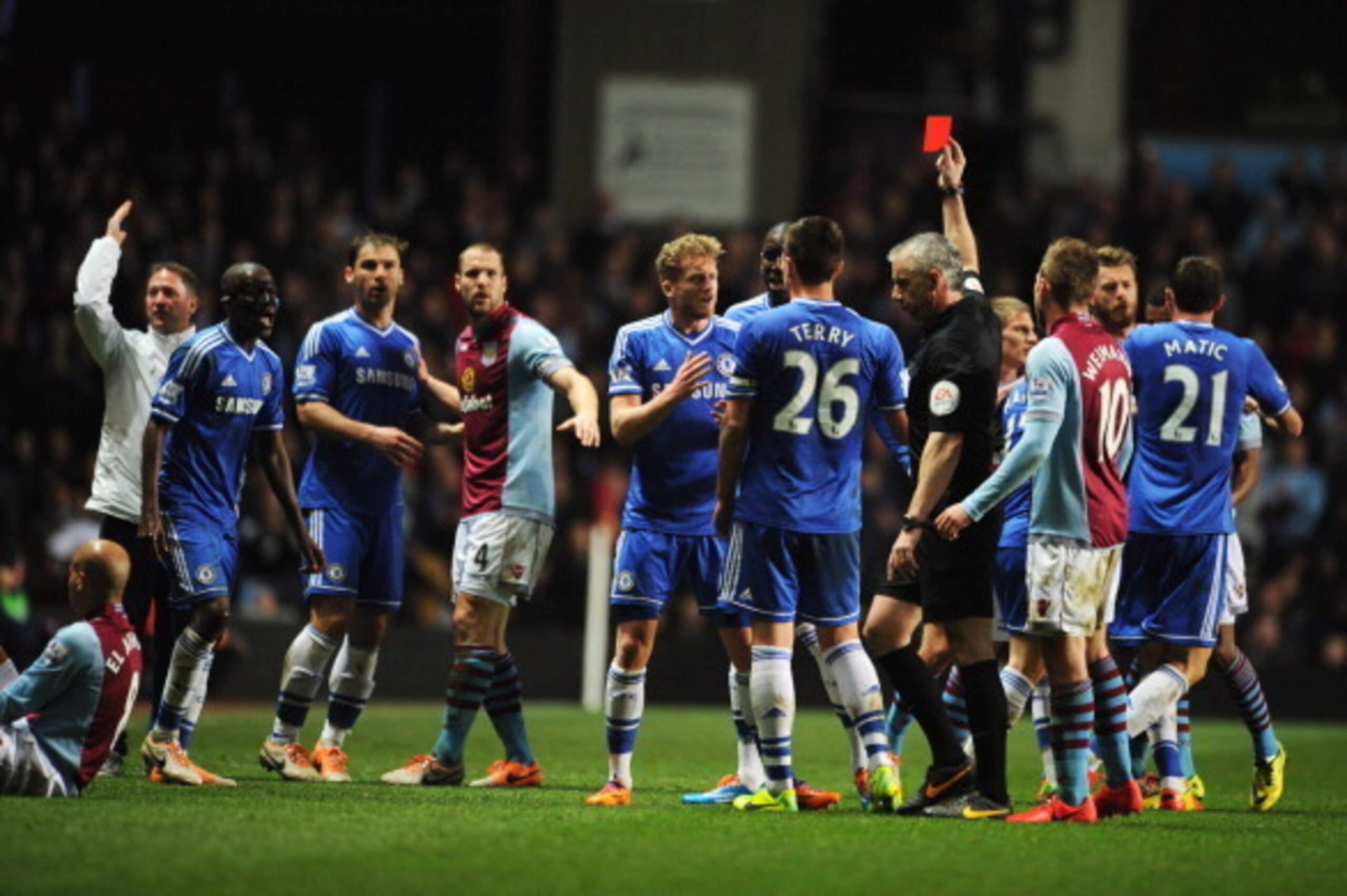 BIRMINGHAM, ENGLAND - MARCH 15:  Ramires of Chelsea (3L) is shown a red card and is sent off by referee Chris Foy after a challenge on Karim El Ahmadi of Aston Villa (L) during the Barclays Premier League match between Aston Villa and Chelsea at Villa Par