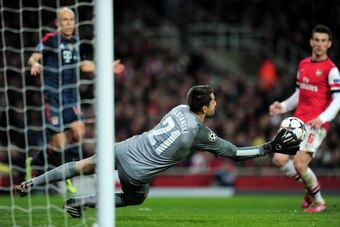 LONDON, ENGLAND - FEBRUARY 19:  Lukasz Fabianski of Arsenal makes a save during the UEFA Champions League Round of 16 first leg match between Arsenal and FC Bayern Muenchen at Emirates Stadium on February 19, 2014 in London, England.  (Photo by Shaun Bott