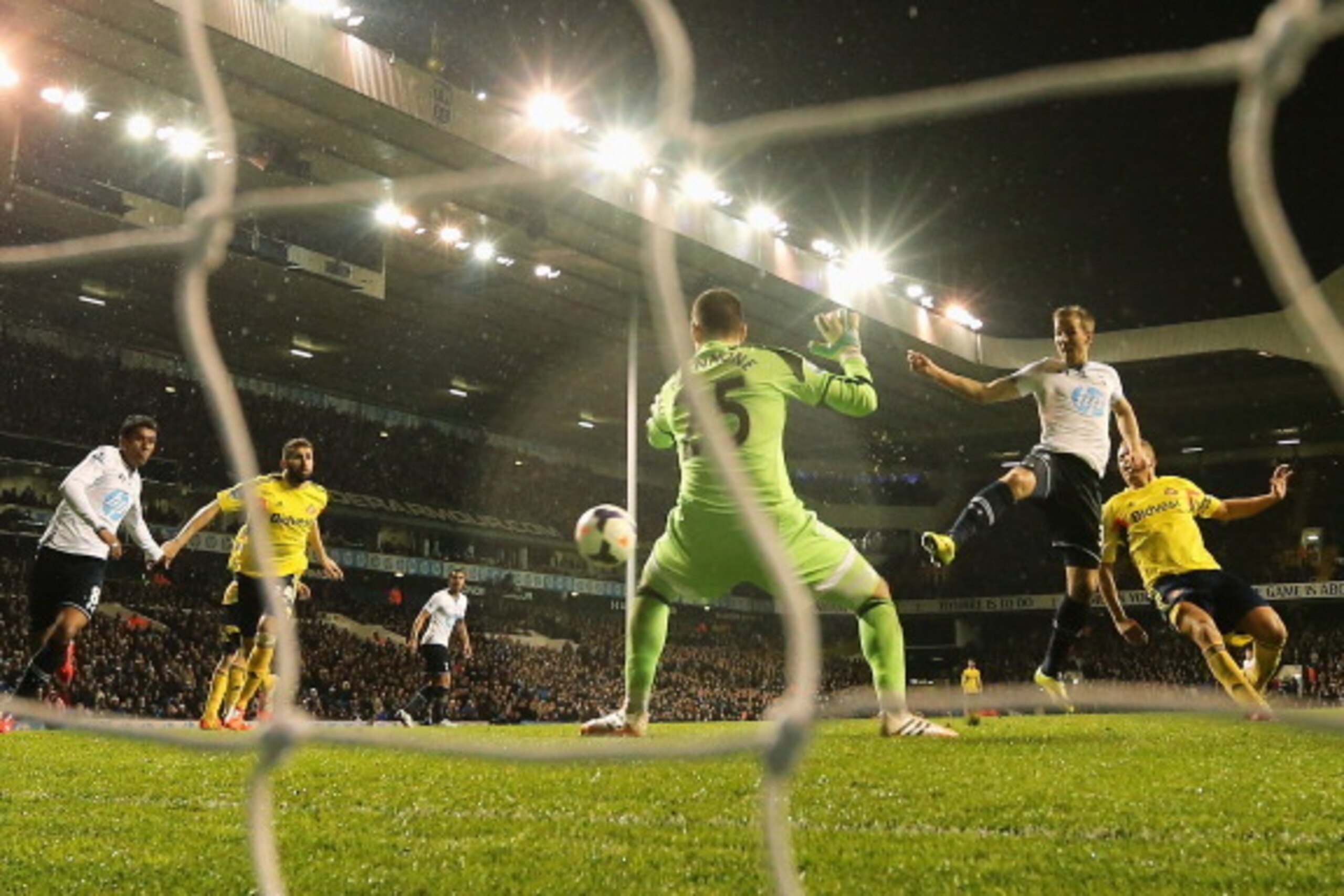LONDON, ENGLAND - APRIL 07:  Harry Kane of Tottenham Hotspur scores his team's second goal past goalkeeper Vito Mannone of Sunderland during the Barclays Premier League match between Tottenham Hotspur and Sunderland at White Hart Lane on April 7, 2014 in