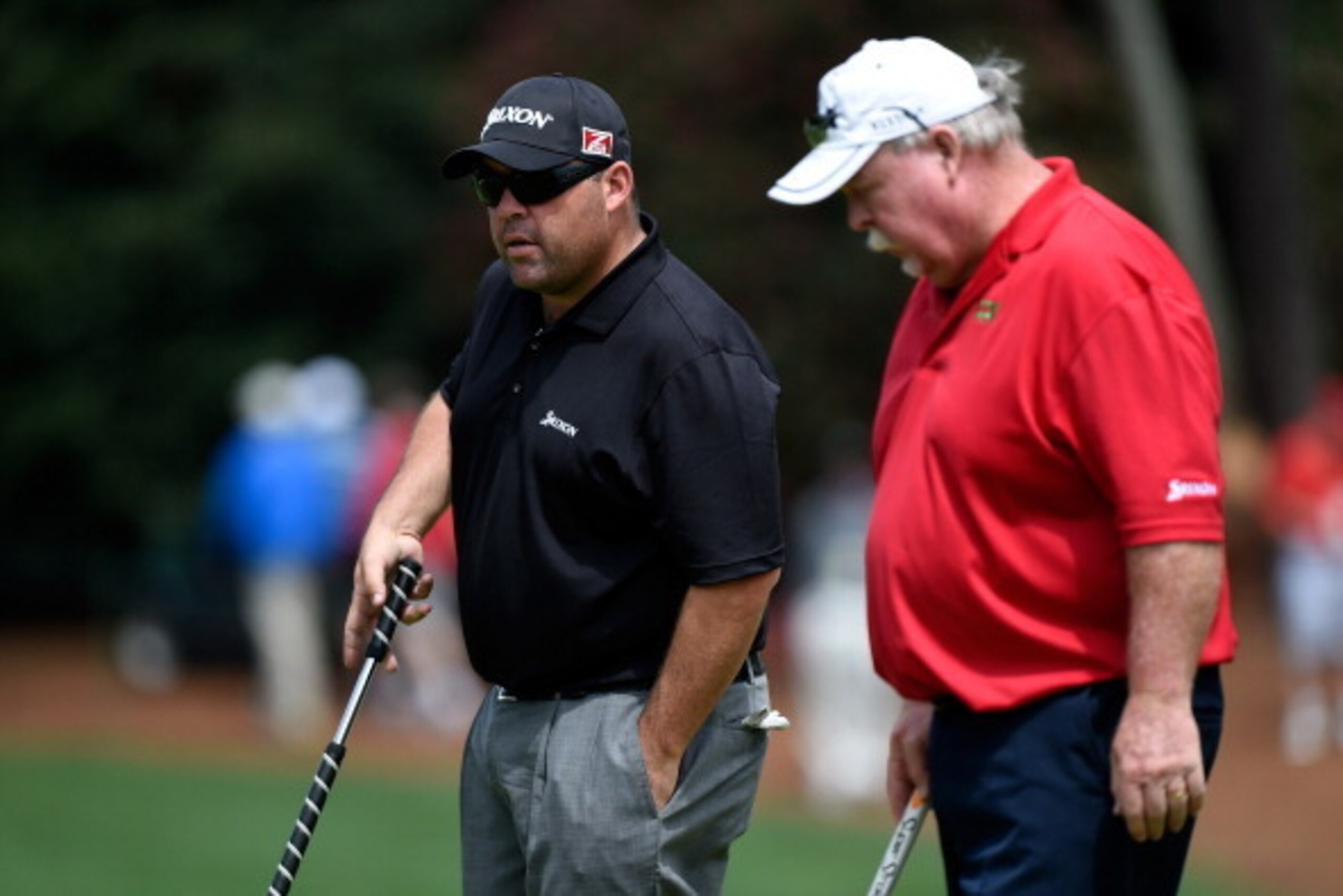 AUGUSTA, GA - APRIL 08:  Kevin and Craig Stadler of the United States look over a green during a practice round prior to the start of the 2014 Masters Tournament at Augusta National Golf Club on April 8, 2014 in Augusta, Georgia.  (Photo by Harry How/Gett