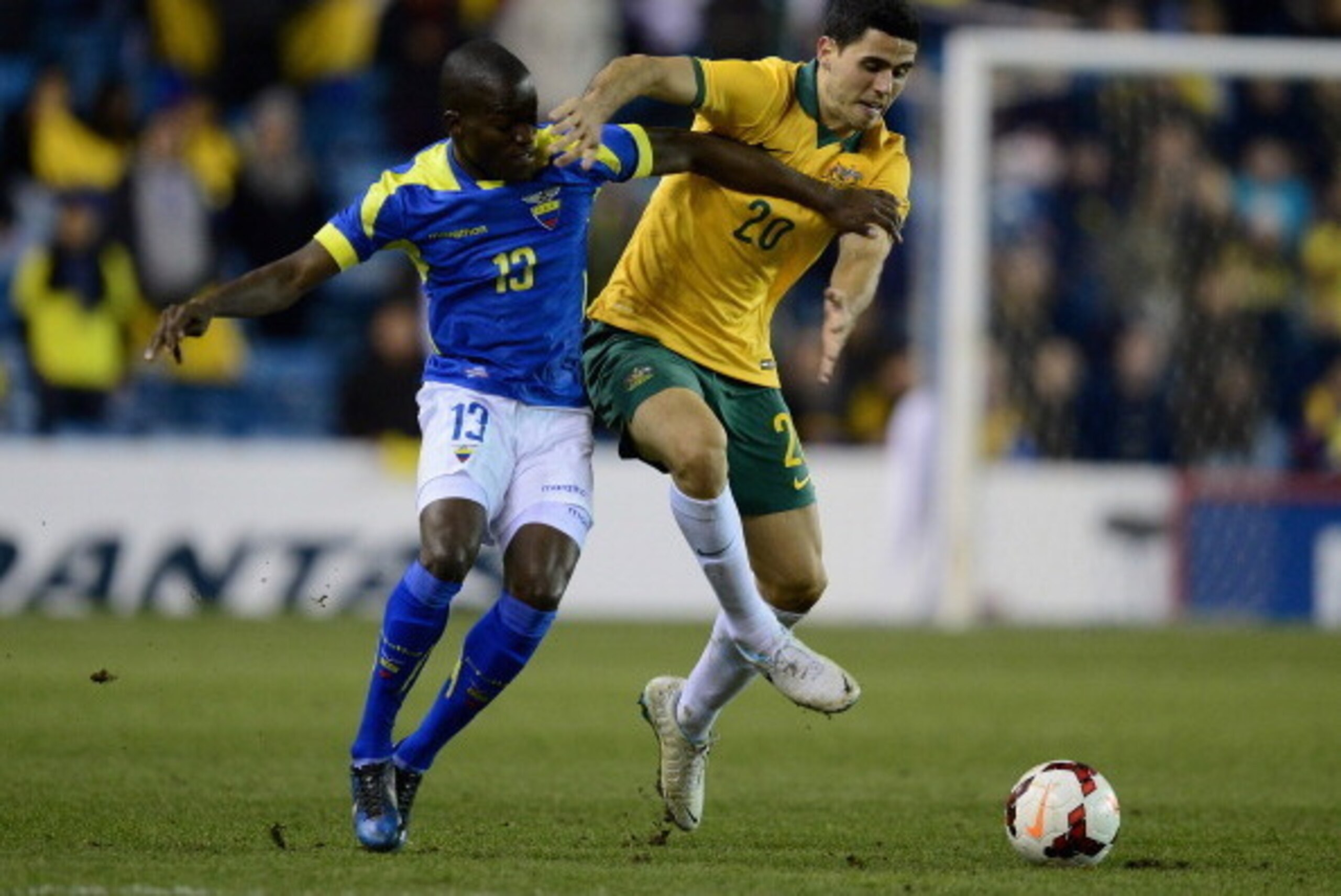 LONDON, ENGLAND - MARCH 05:  Tom Rogic of Australia battles with Enner Valencia of Ecuador during the International Friendly match between Australia and Ecuador at The Den on March 5, 2014 in London, England.  (Photo by Jamie McDonald/Getty Images)