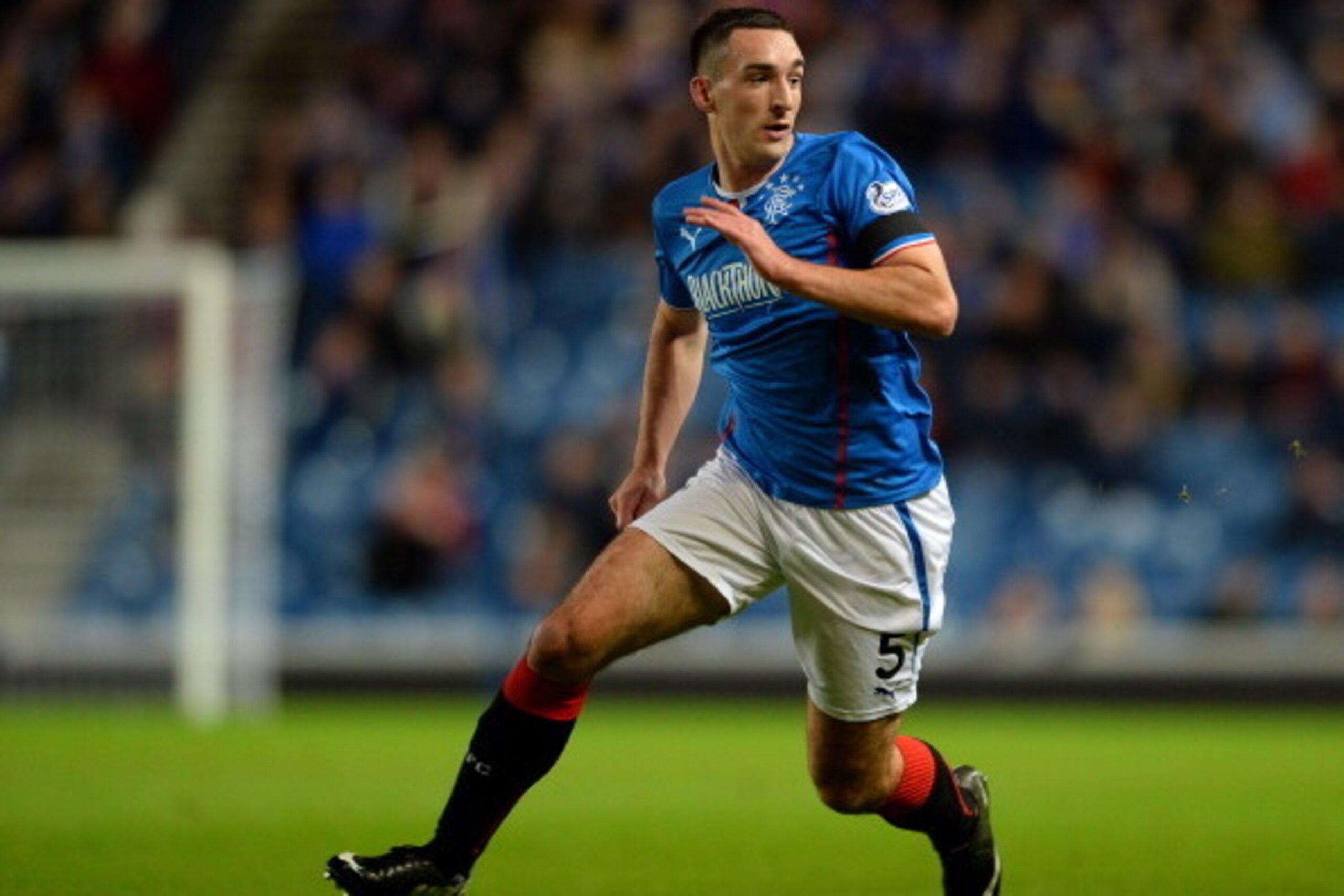 GLASGOW, SCOTLAND - NOVEMBER 1:  Lee Wallace of Rangers in action during the The William Hill Scottish Cup Third Round match at Ibrox Stadium on November 1, 2013 in Glasgow, Scotland. (Photo by Mark Runnacles/Getty Images)