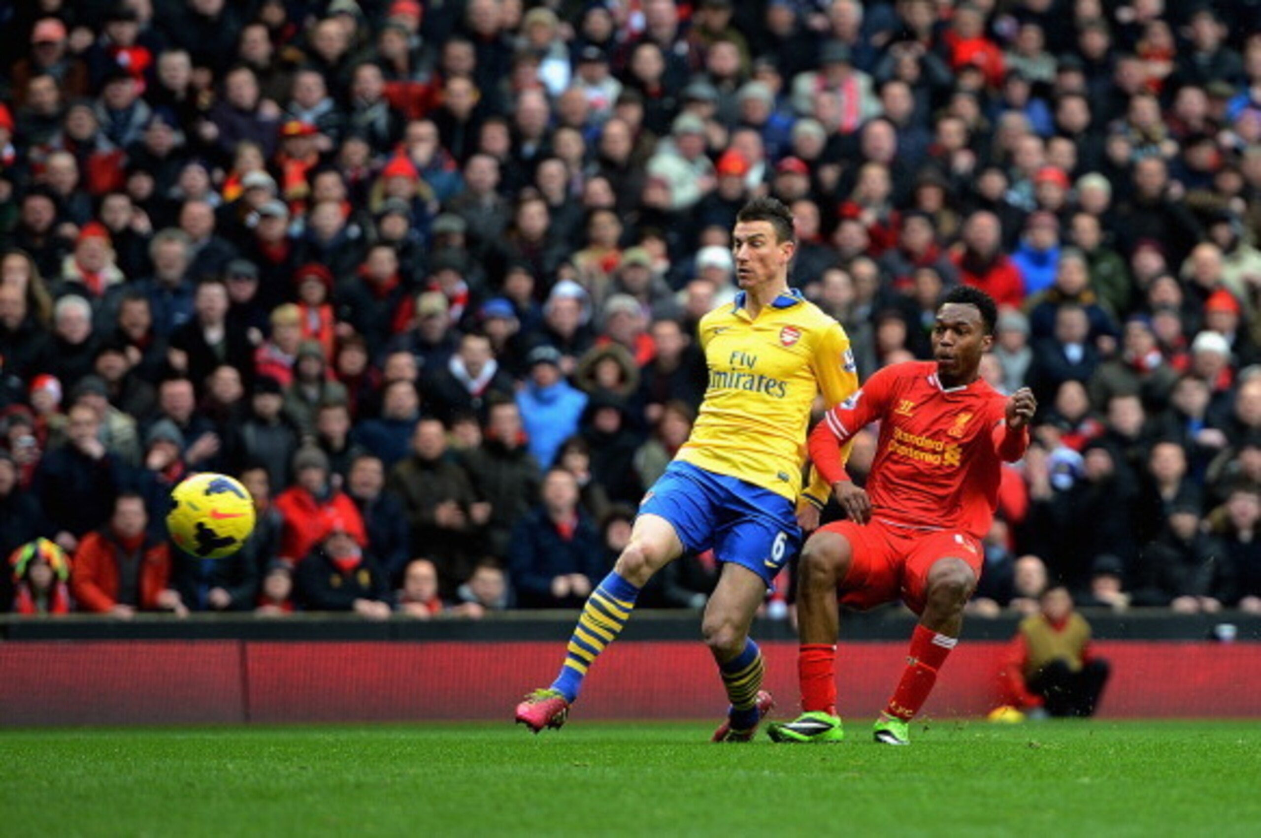 LIVERPOOL, ENGLAND - FEBRUARY 08:  Daniel Sturridge of Liverpool scores the fourth goal during the Barclays Premier League match between Liverpool and Arsenal at Anfield on February 8, 2014 in Liverpool, England.  (Photo by Michael Regan/Getty Images)