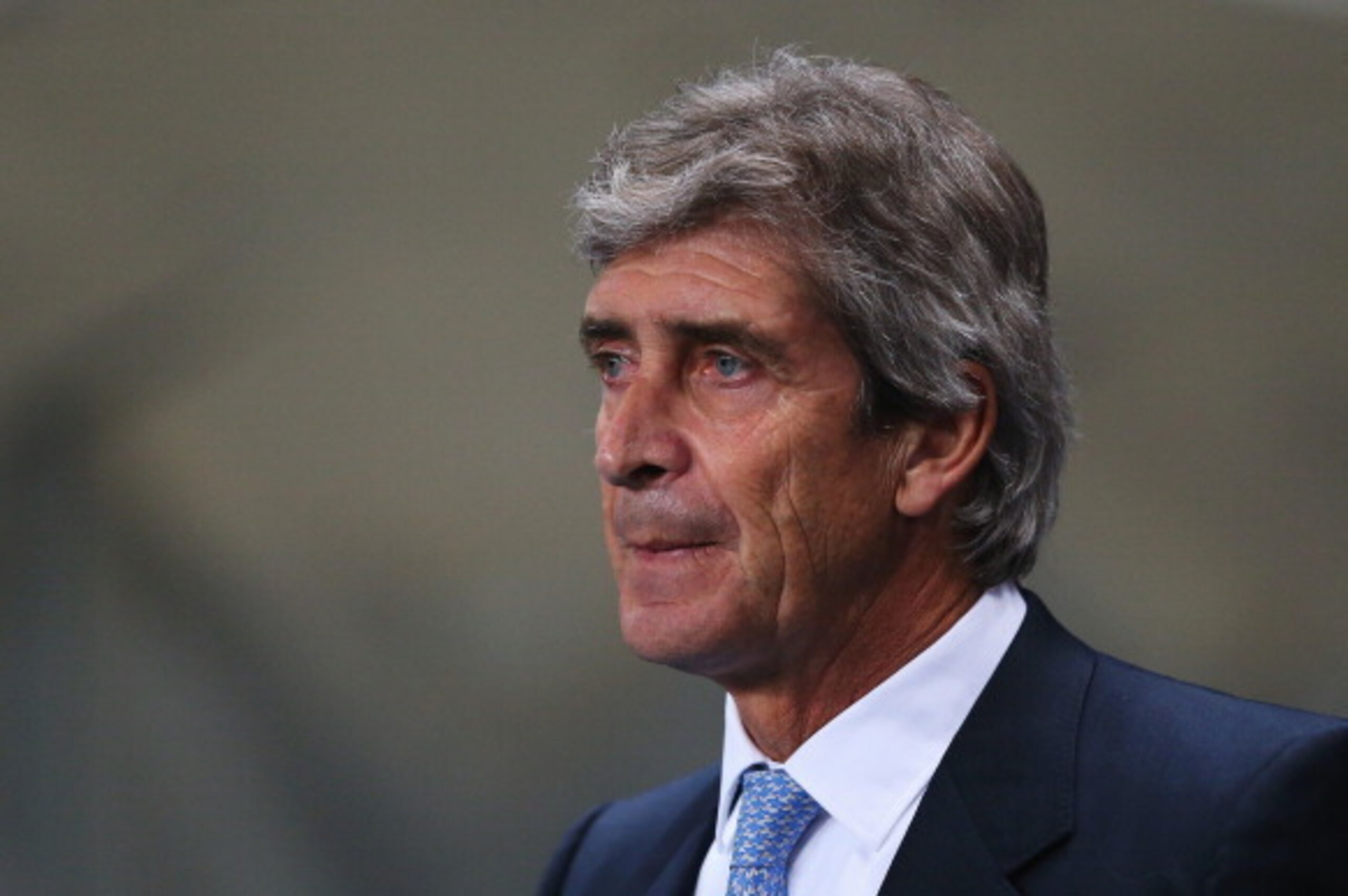 MANCHESTER, ENGLAND - DECEMBER 26: Manuel Pellegrini, manager of Manchester City looks on prior to the Barclays Premier League match between Manchester City and Liverpool at Etihad Stadium on December 26, 2013 in Manchester, England.  (Photo by Alex Lives