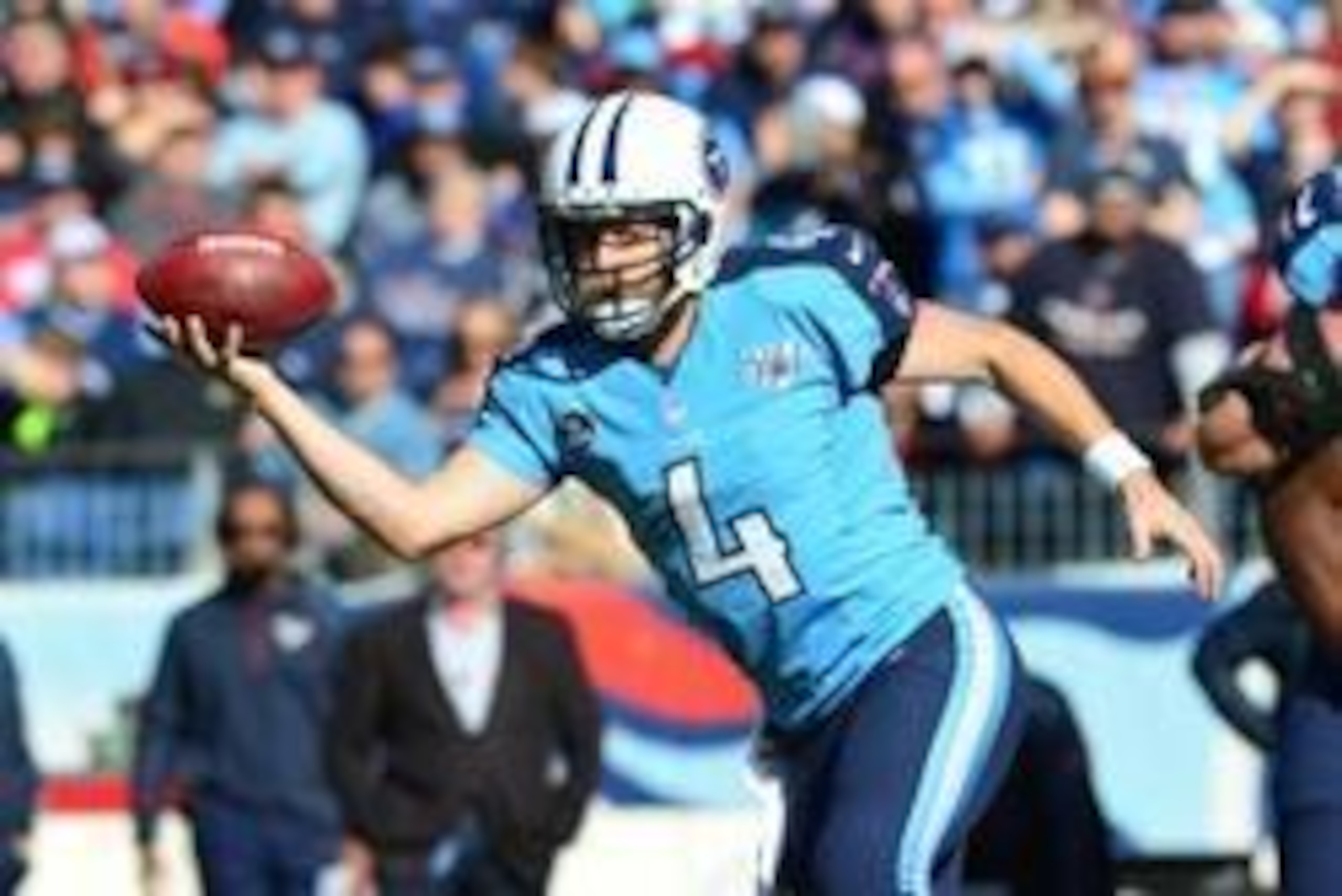 Dec 29, 2013; Nashville, TN, USA; Tennessee Titans quarterback Ryan Fitzpatrick (4) handles a bad snap against the Houston Texans during the first half at LP Field. Mandatory Credit: Don McPeak-USA TODAY Sports