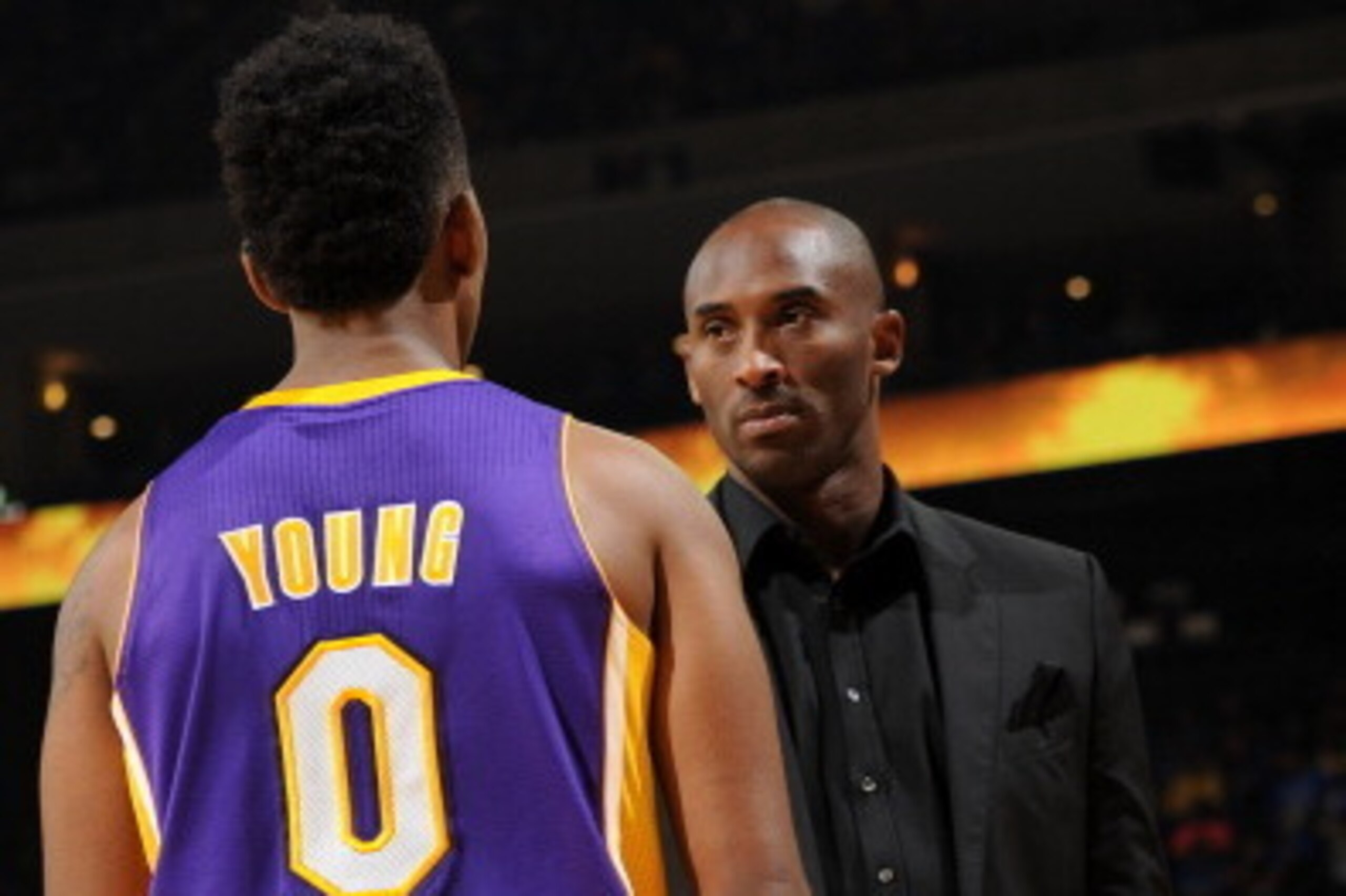OAKLAND, CA - OCTOBER 30: Kobe Bryant #24 and Nick Young #0 of the Los Angeles Lakers converse during a game against the Golden State Warriors at Oracle Arena on October 30, 2013 at in Oakland, California. NOTE TO USER: User expressly acknowledges and agr