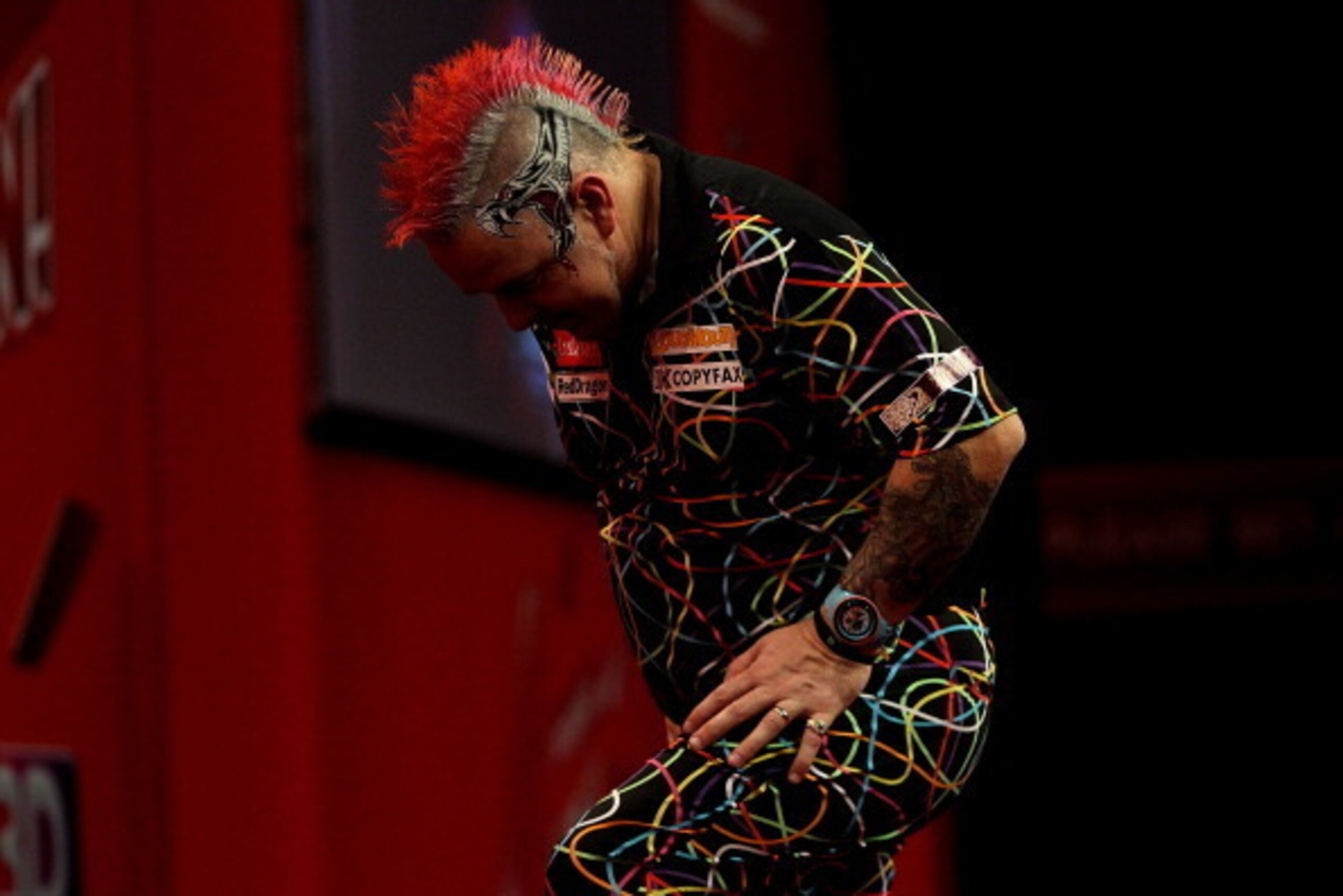 LONDON, ENGLAND - JANUARY 01: Peter Wright of Scotland looks dejected during the final of the Ladbrokes.com World Darts Championships at Alexandra Palace on January 1, 2014 in London, England.  (Photo by Ben Hoskins/Getty Images)
