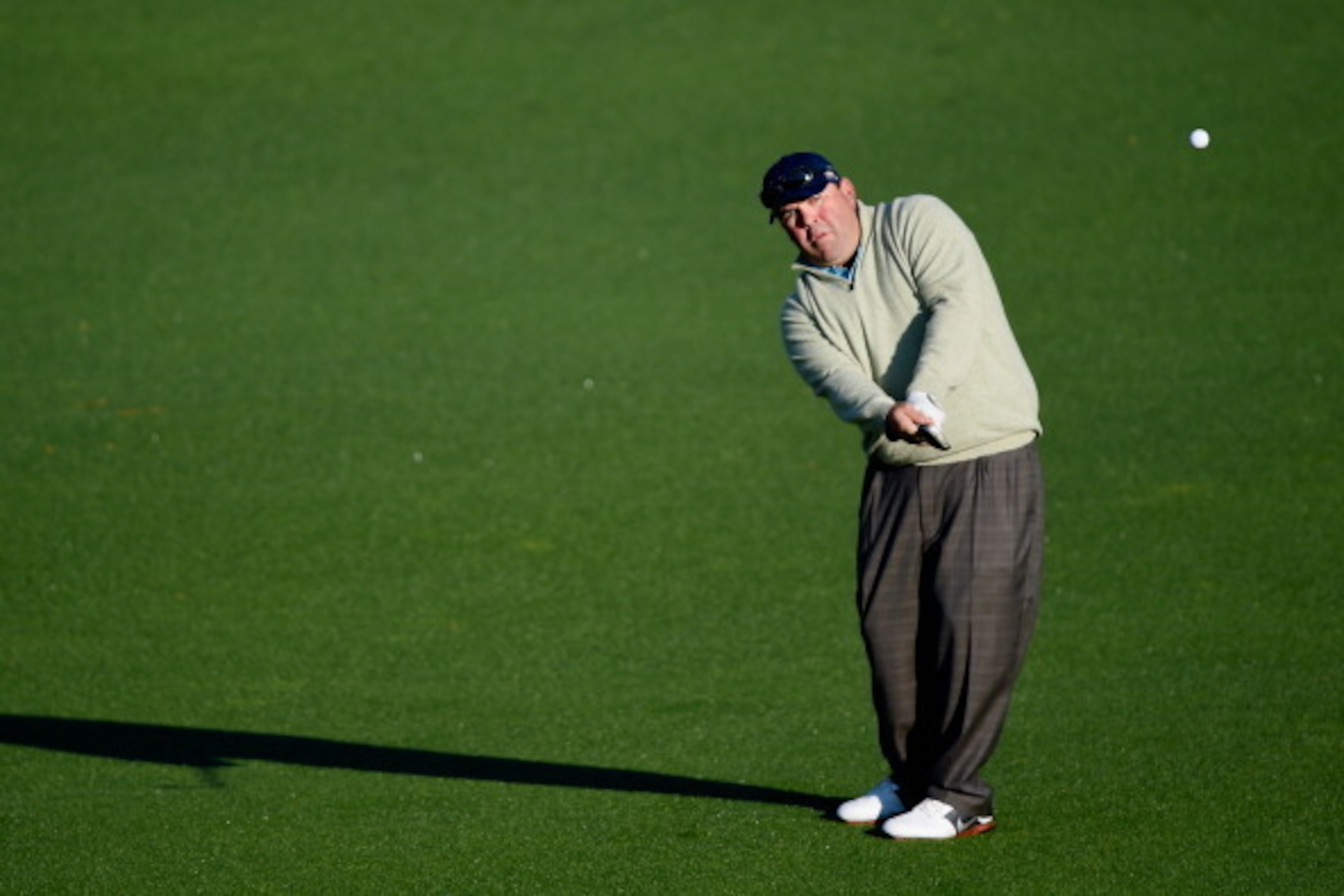 AUGUSTA, GA - APRIL 10:  Kevin Stadler of the United States hits a pitch shot to the second green during the first round of the 2014 Masters Tournament at Augusta National Golf Club on April 10, 2014 in Augusta, Georgia.  (Photo by Harry How/Getty Images)