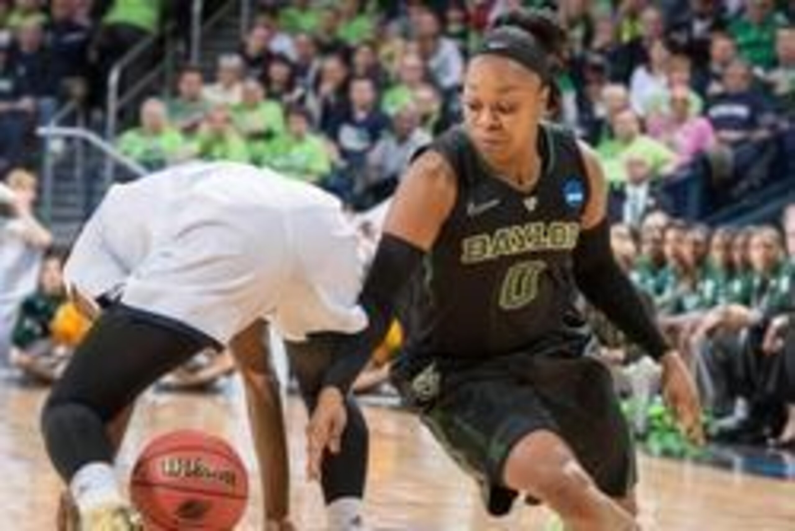 Mar 31, 2014; Notre Dame, IN, USA; Baylor Bears guard Odyssey Sims (0) battles for the ball with Notre Dame Fighting Irish guard Jewel Loyd (32) in the first half in the finals of the Notre Dame regional in the 2014 NCAA Tournament at the Purcell Pavilion