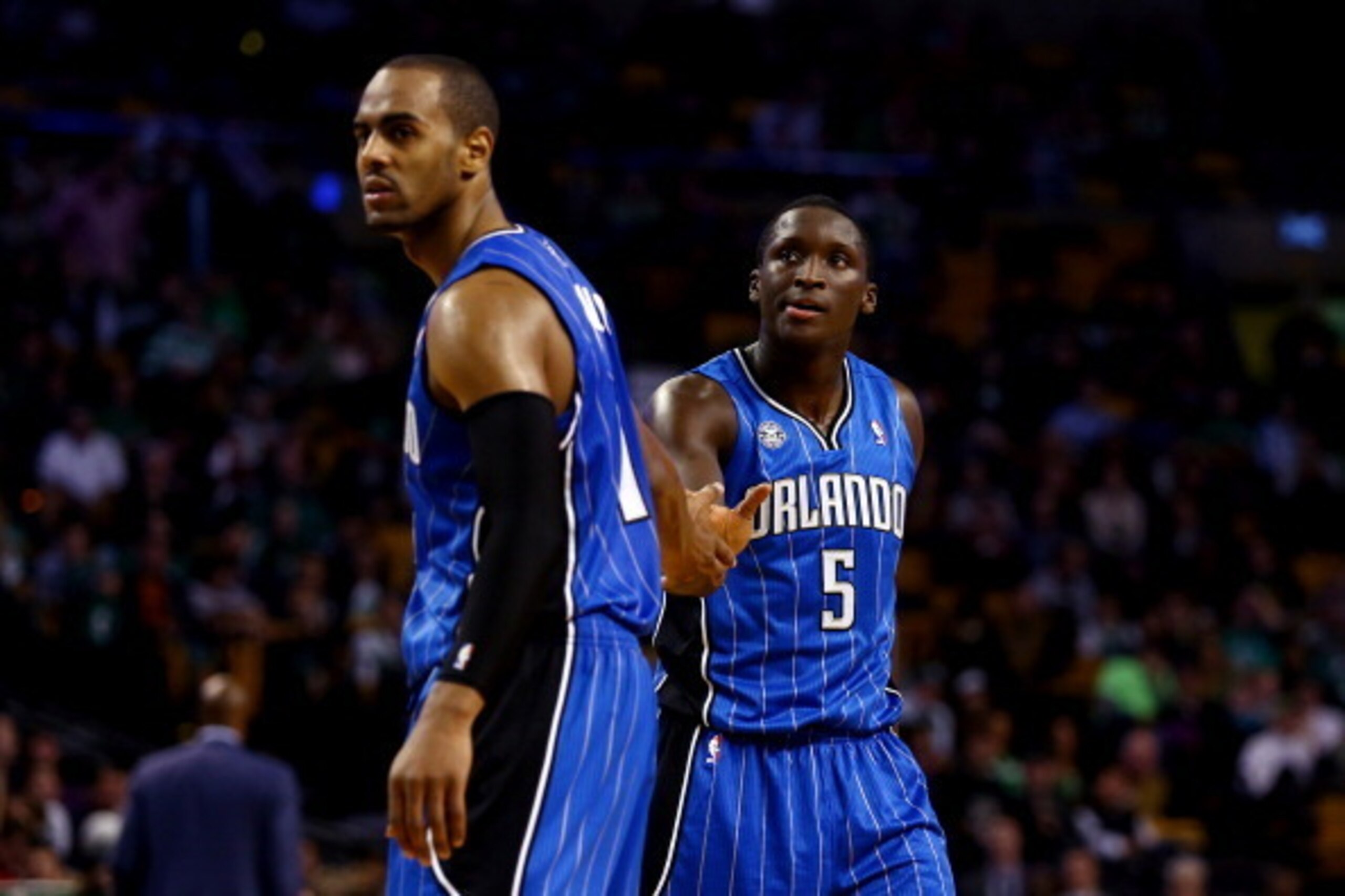 BOSTON, MA - NOVEMBER 11: Victor Oladipo #5 celebrates a basket with Arron Afflalo #4 of the Orlando Magic against the Boston Celtics during a game at the TD Garden on November 11, 2013 in Boston, Massachusetts. NOTE TO USER: User expressly acknowledges a