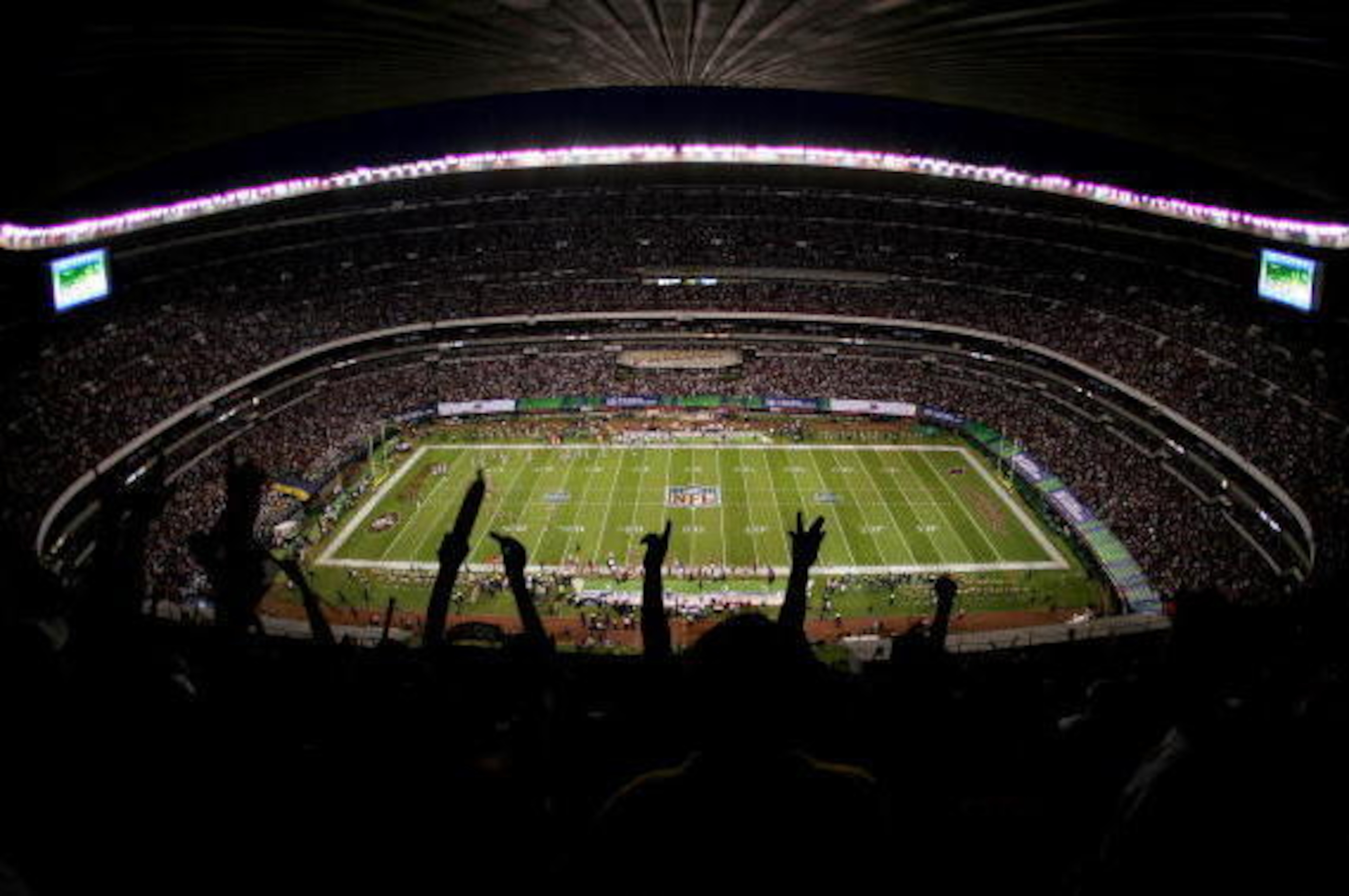 MEXICO CITY - OCTOBER 2:  The fans cheer as the San Francisco 49ers score their first touchdown during the NFL game against the Arizona Cardinals at Estadio Azteca in Mexico City, Mexico.  The Cardinals won 31-14.  (Photo by Robert Laberge/Getty Images)