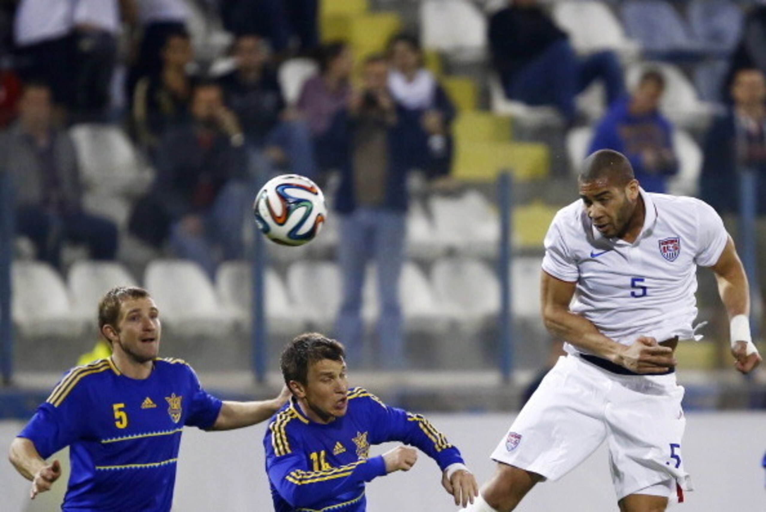LARNACA, CYPRUS - MARCH 05:  Oguchi Onyewu (R) of the USA in action during the Ukraine v USA International Friendly  at Antonis Papadopoulos stadium on March 5, 2014 in Larnaca, Cyprus.  (Photo by Andrew Caballero-Reynolds/Getty Images)