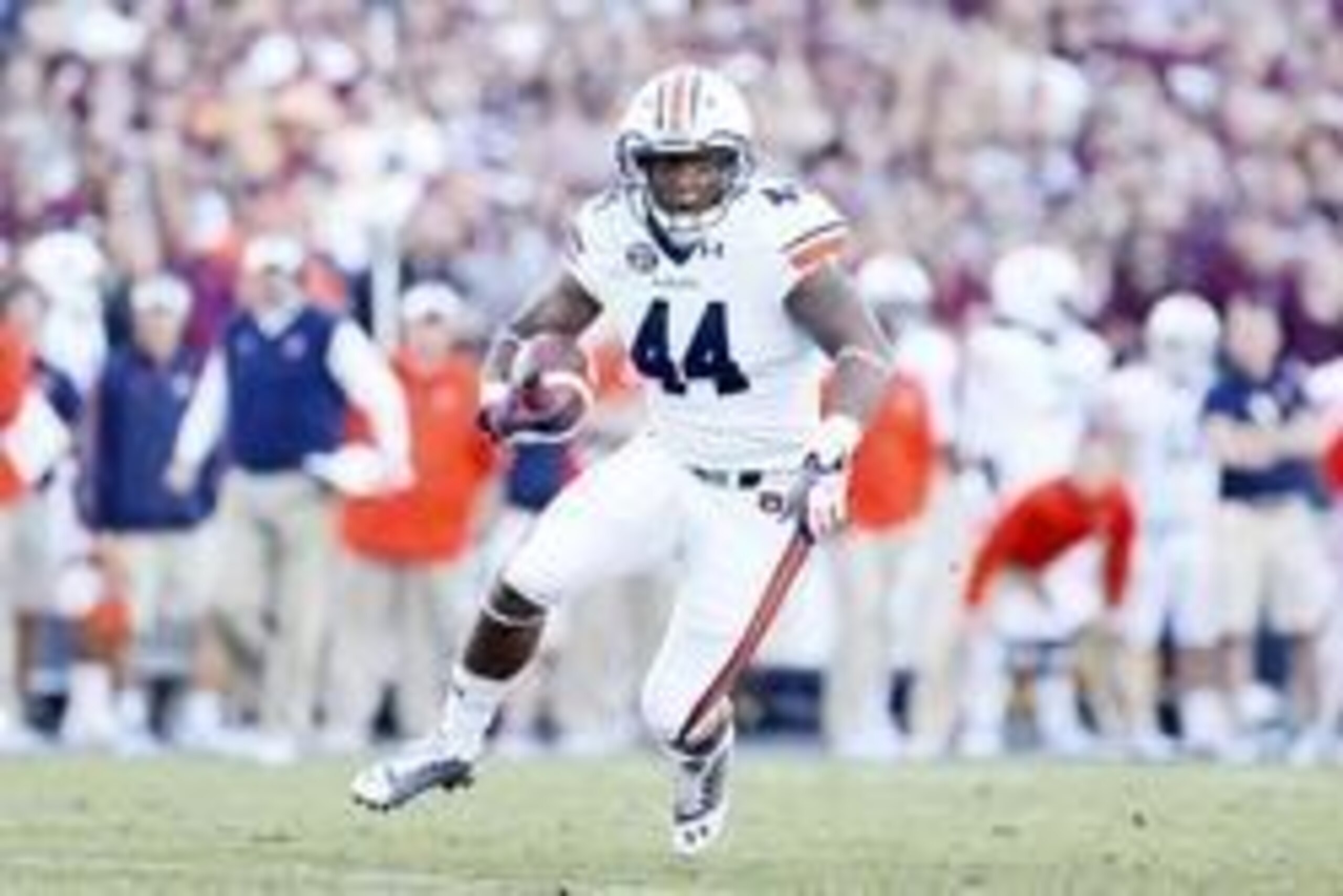 Oct 19, 2013; College Station, TX, USA; Auburn Tigers running back Cameron Artis-Payne (44) runs with the ball against the Texas A&M Aggies during the second half at Kyle Field. Mandatory Credit: Soobum Im-USA TODAY Sports