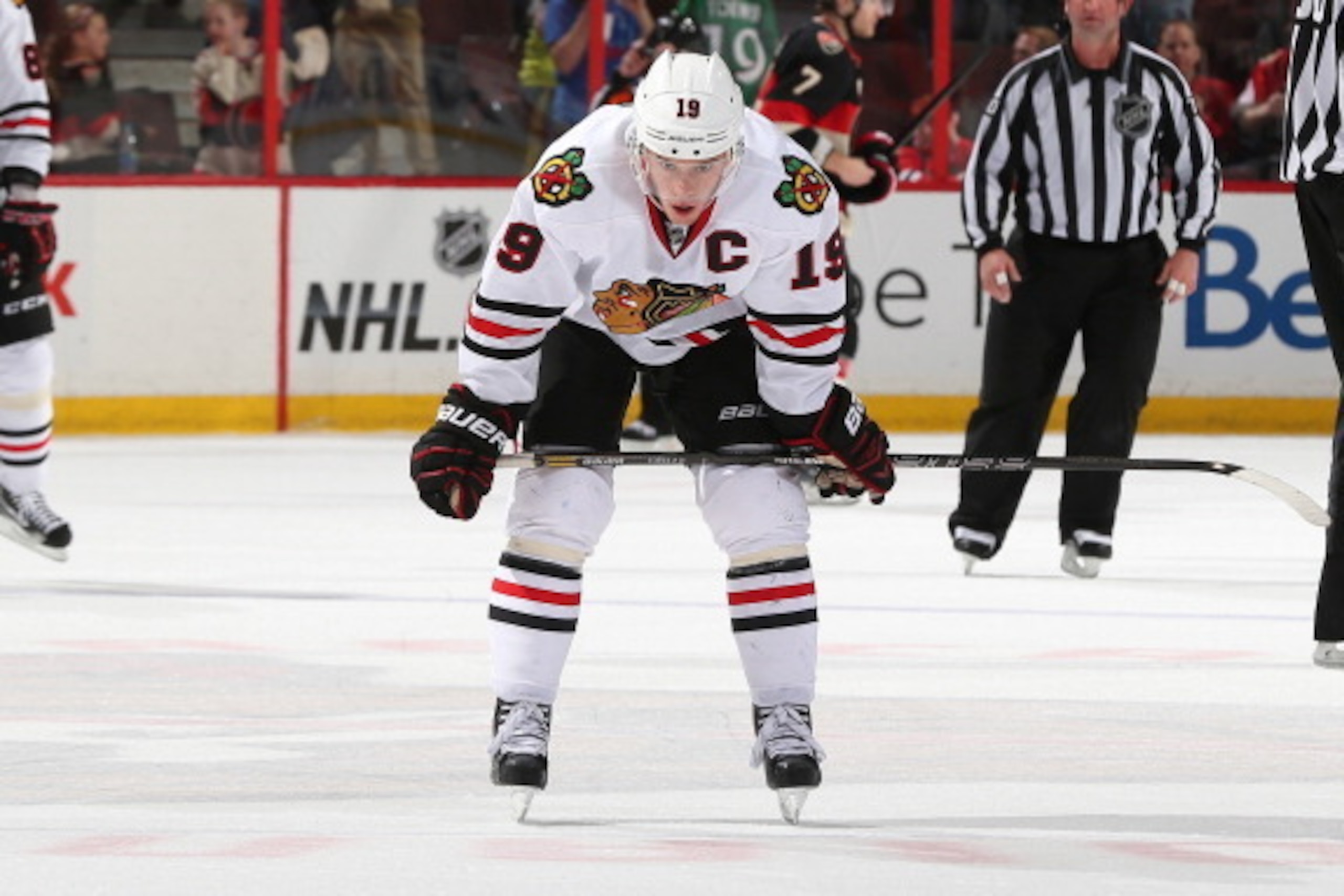 OTTAWA, ON - MARCH 28: Jonathan Toews #19 of the Chicago Blackhawks hunches over after a loss against the Ottawa Senators at Canadian Tire Centre on March 28, 2014 in Ottawa, Ontario, Canada.  (Photo by Andre Ringuette/NHLI via Getty Images)