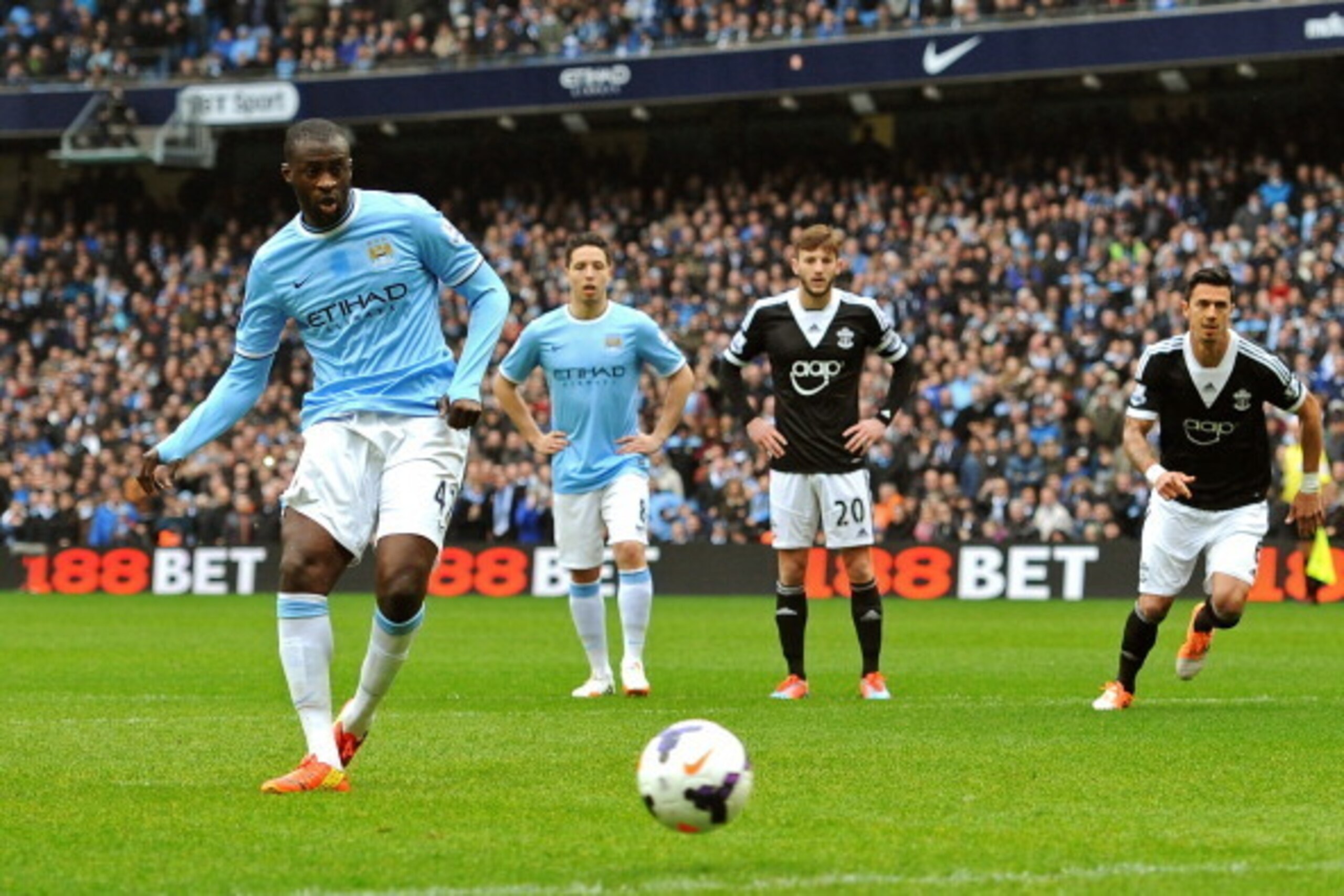 MANCHESTER, ENGLAND - APRIL 05:  Yaya Toure of Manchester City scores the opening goal from the penalty spot during the Barclays Premier League match between Manchester City and Southampton at Etihad Stadium on April 5, 2014 in Manchester, England.  (Phot