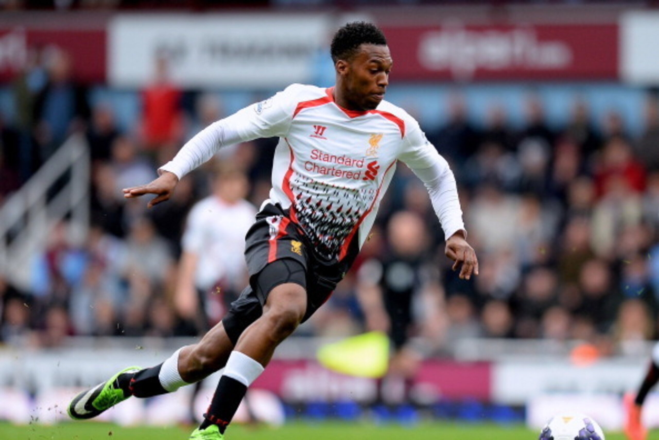 LONDON, ENGLAND - APRIL 06:  Daniel Sturridge of Liverpool runs with the ball during the Barclays Premier League match between West Ham United and Liverpool at Boleyn Ground on April 6, 2014 in London, England.  (Photo by Mike Hewitt/Getty Images)