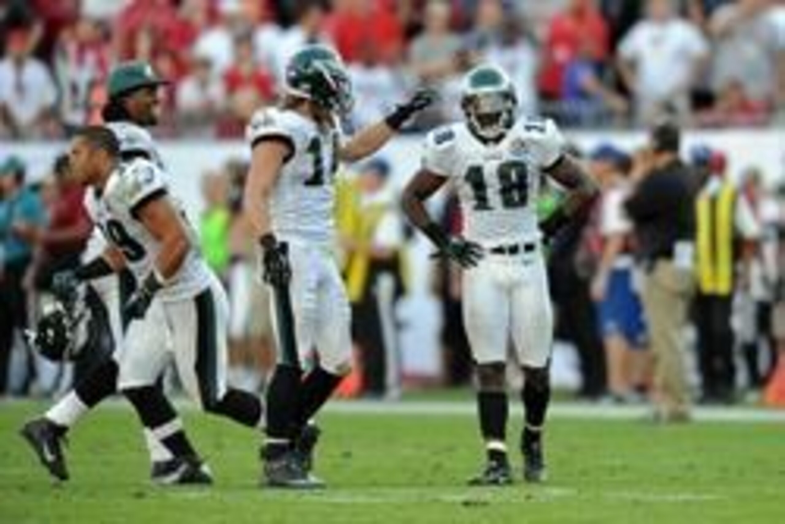 Dec 9, 2012; Tampa FL, USA; Philadelphia Eagles wide receiver Jeremy Maclin (18) and wide receiver Riley Cooper (14) during a game against the Tampa Bay Buccaneers at Raymond James Stadium. Mandatory Credit: Steve Mitchell-USA TODAY Sports