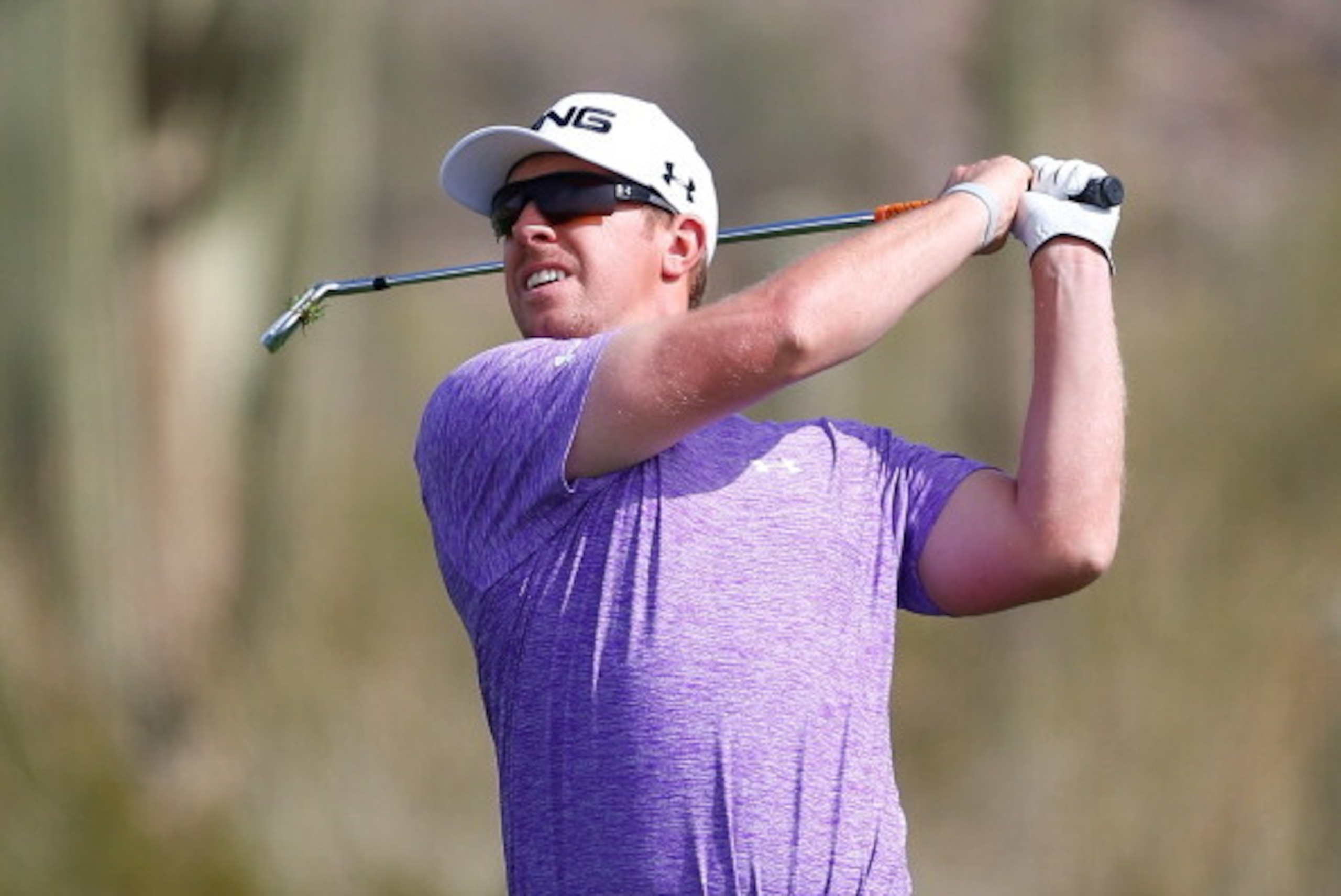 MARANA, AZ - FEBRUARY 21:  Hunter Mahan plays his second shot on the first hole during the third round of the World Golf Championships - Accenture Match Play Championship at The Golf Club at Dove Mountain on February 21, 2014 in Marana, Arizona.  (Photo b