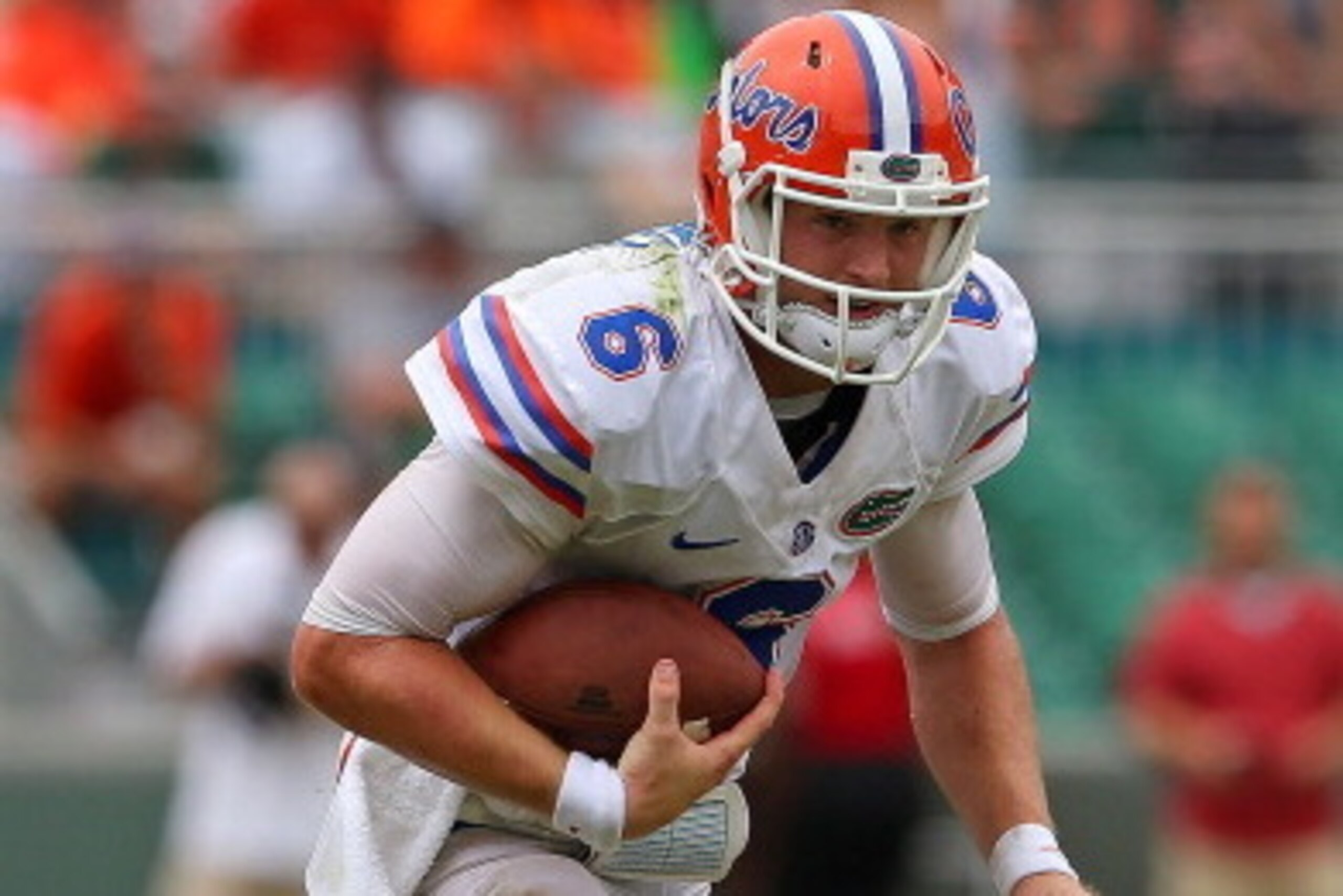 MIAMI GARDENS, FL - SEPTEMBER 07:  Jeff Driskel #6 of the Florida Gators rushes during a game against the Miami Hurricanes at Sun Life Stadium on September 7, 2013 in Miami Gardens, Florida.  (Photo by Mike Ehrmann/Getty Images)