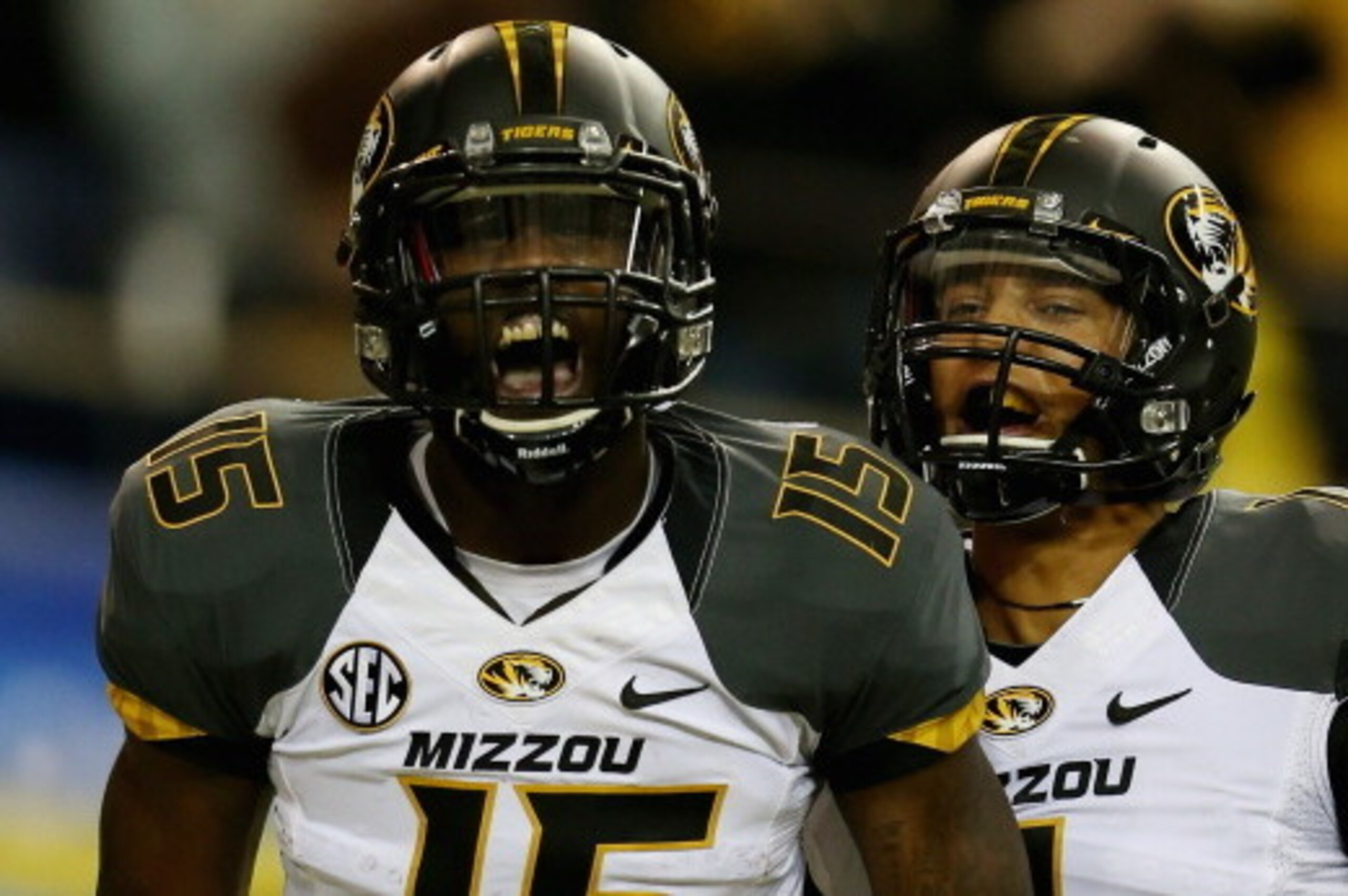 ATLANTA, GA - DECEMBER 07:  Dorial Green-Beckham #15 of the Missouri Tigers celebrates his touchdown in the first quarter with teammate Marcus Murphy #6 against the Auburn Tigers during the SEC Championship Game at Georgia Dome on December 7, 2013 in Atla