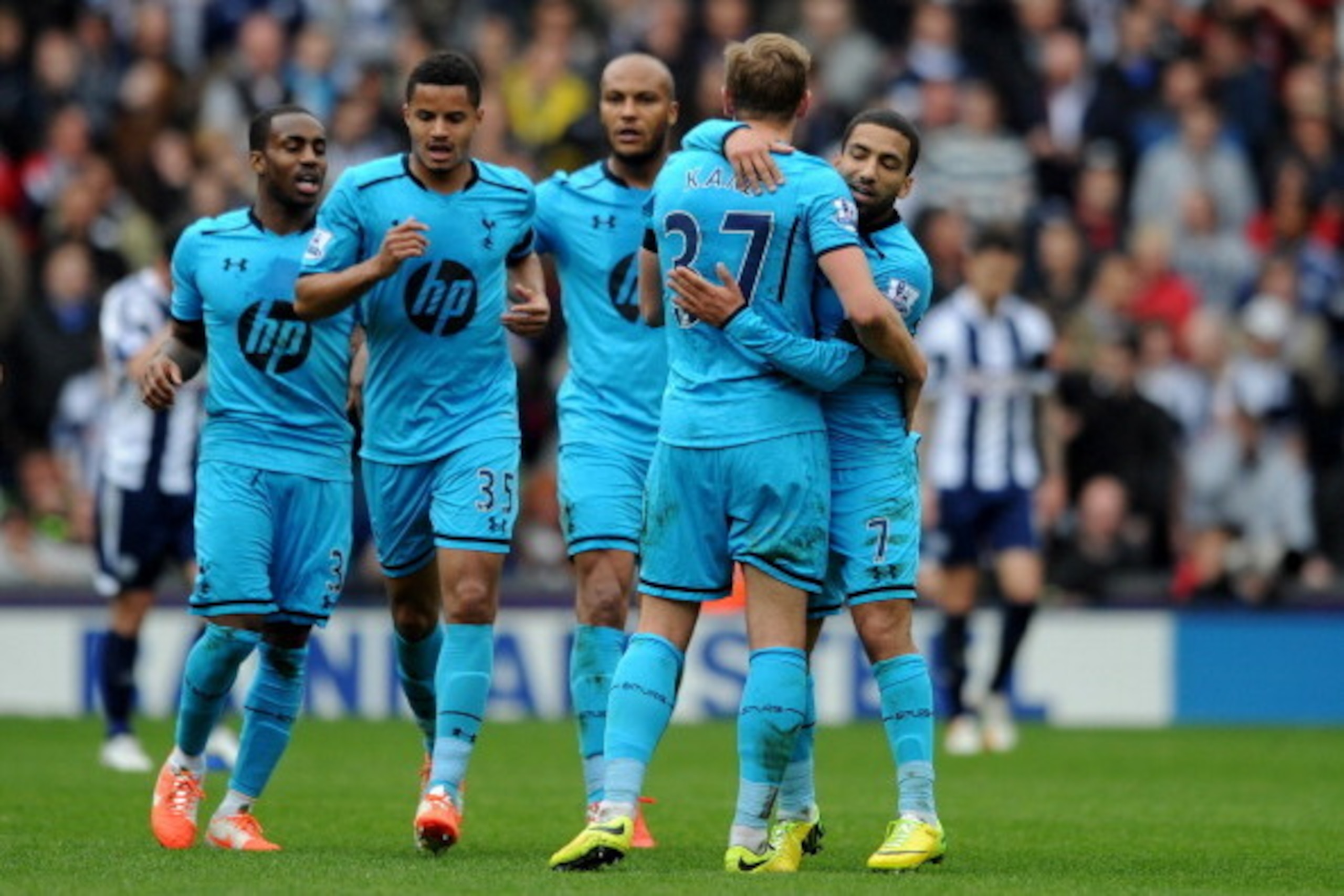 WEST BROMWICH, ENGLAND - APRIL 12:  Harry Kane #37 of Spurs is congratulated by teammates after scoring his team's second goal during the Barclays Premier League match between West Bromwich Albion and Tottenham Hotspur at The Hawthorns on April 12, 2014 i