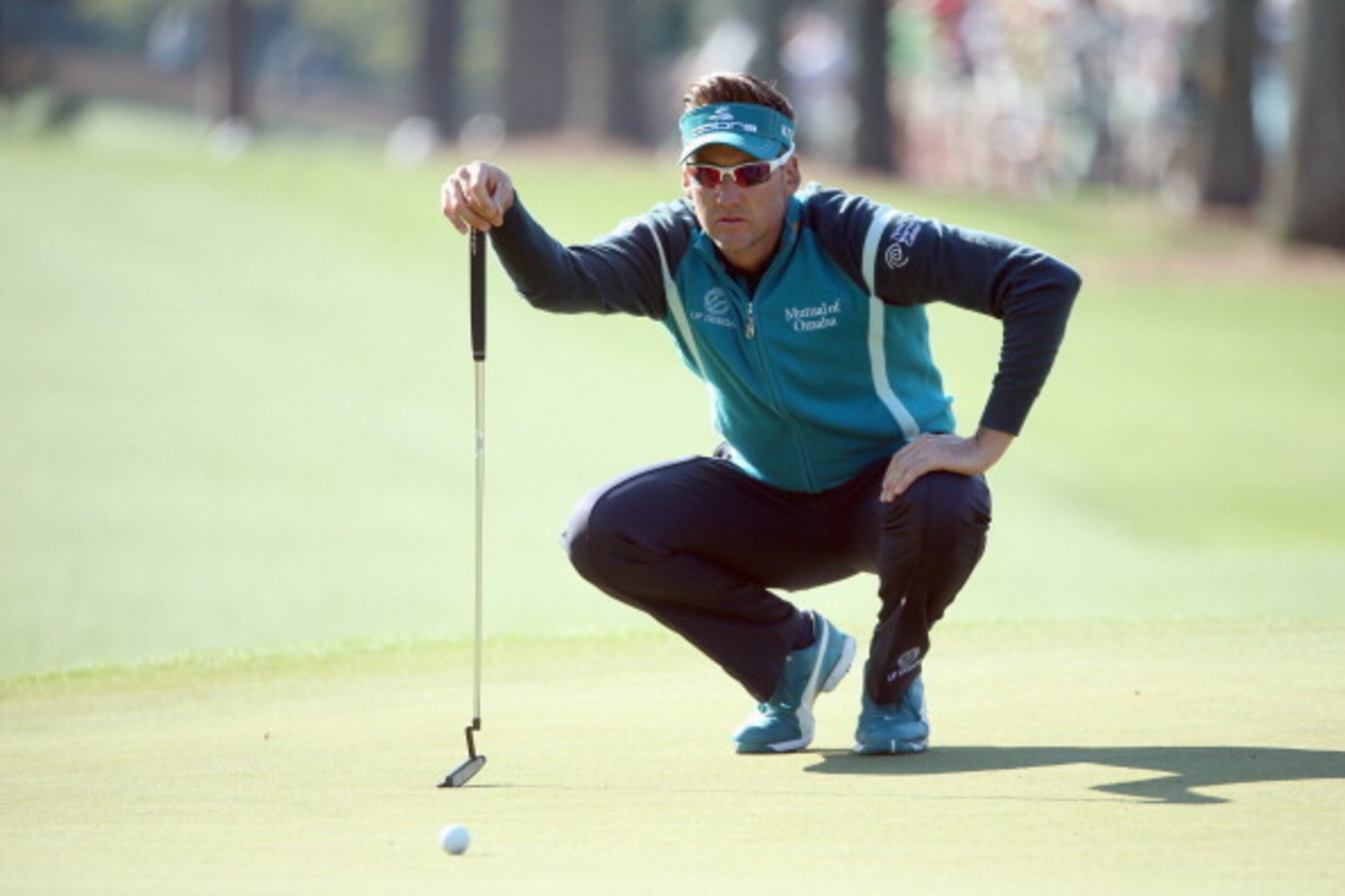 AUGUSTA, GA - APRIL 10:  Ian Poulter of England putts on the first green during the first round of the 2014 Masters Tournament at Augusta National Golf Club on April 10, 2014 in Augusta, Georgia.  (Photo by Andrew Redington/Getty Images)