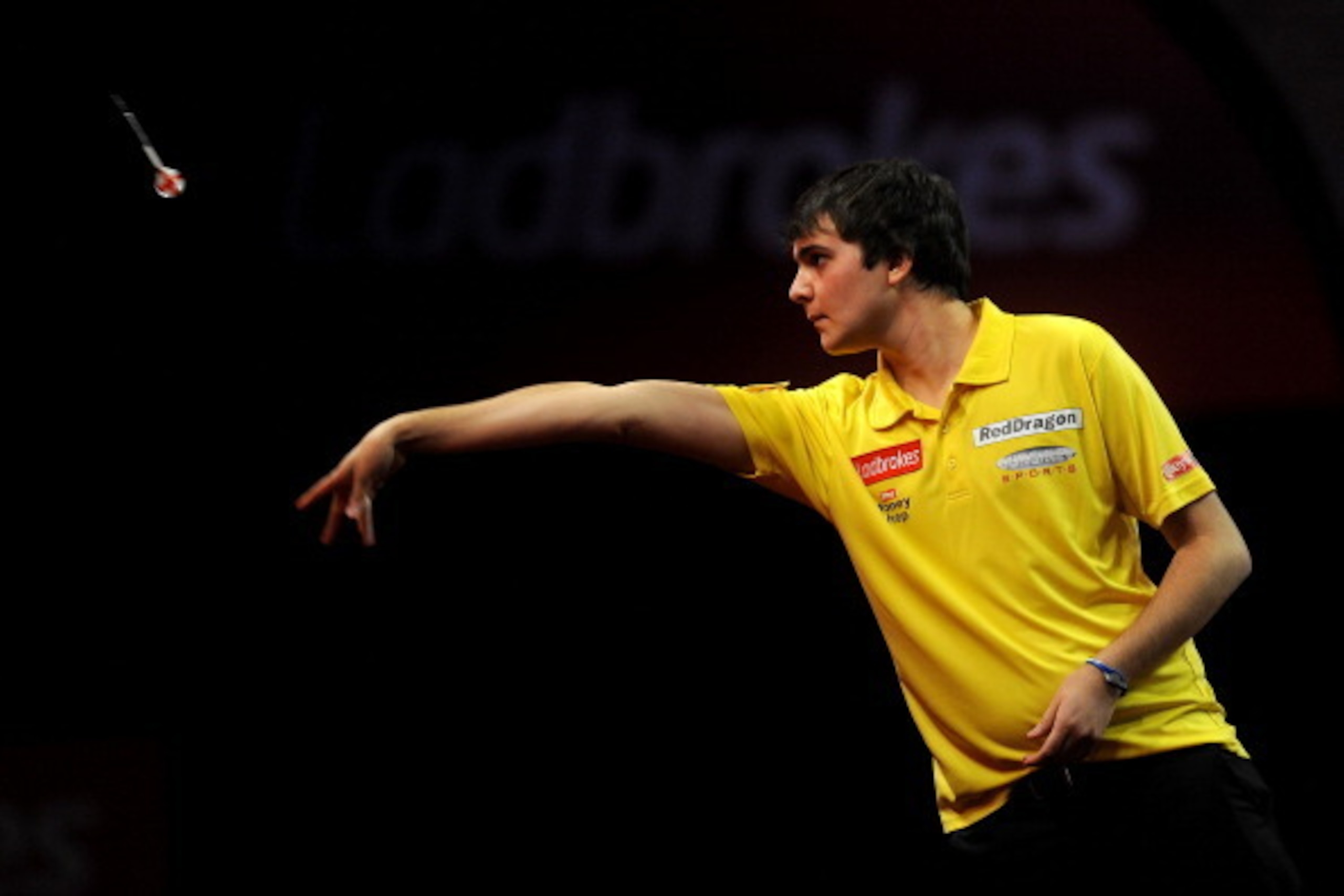 LONDON, ENGLAND - DECEMBER 15: James Hubbard of England in action during his first round match on day two of the Ladbrokes.com World Darts Championship at Alexandra Palace on December 15, 2012 in London, England. (Photo by Charlie Crowhurst/Getty Images)