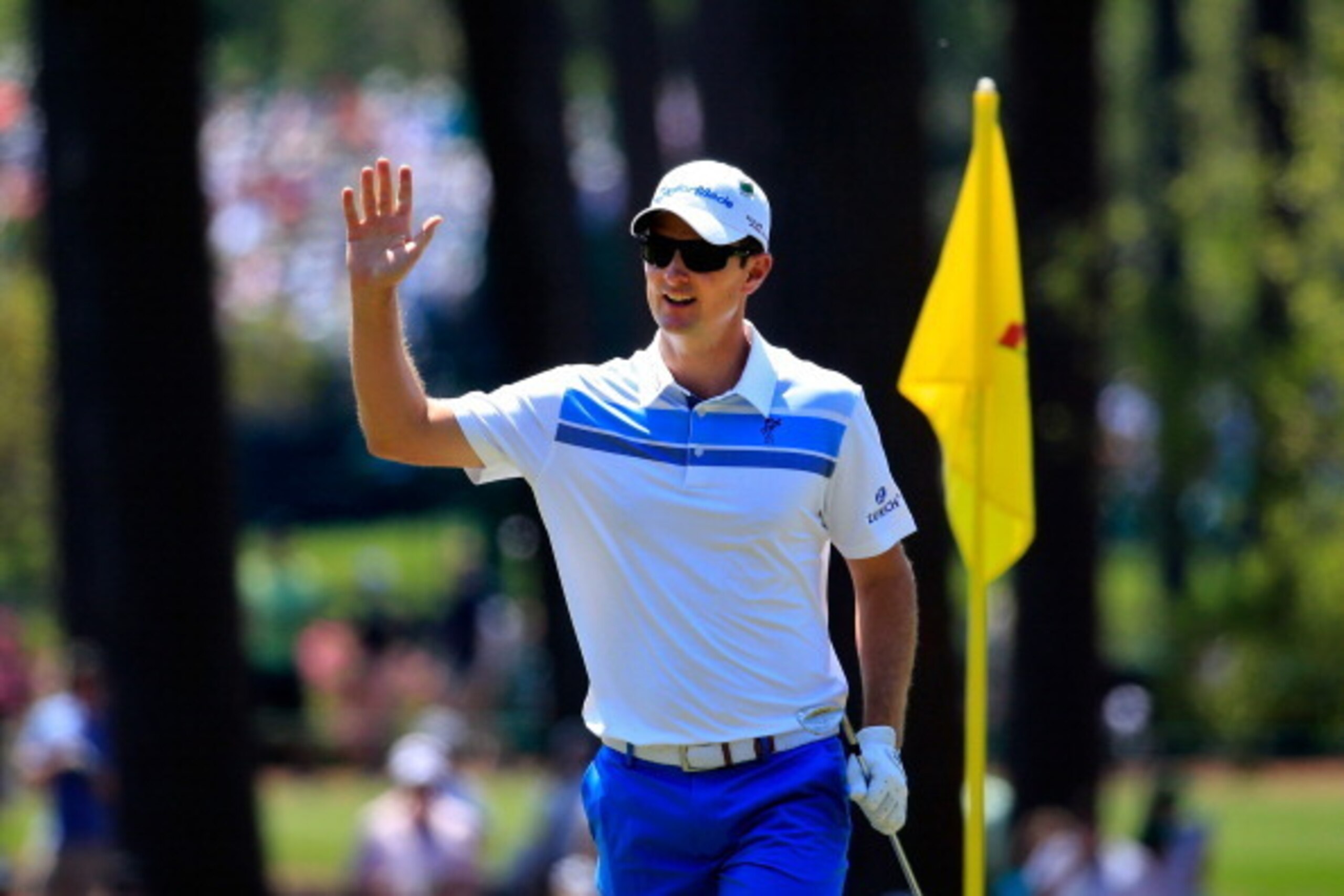 AUGUSTA, GA - APRIL 12:  Justin Rose of England makes eagle on the third hole during the third round of the 2014 Masters Tournament at Augusta National Golf Club on April 12, 2014 in Augusta, Georgia.  (Photo by Rob Carr/Getty Images)