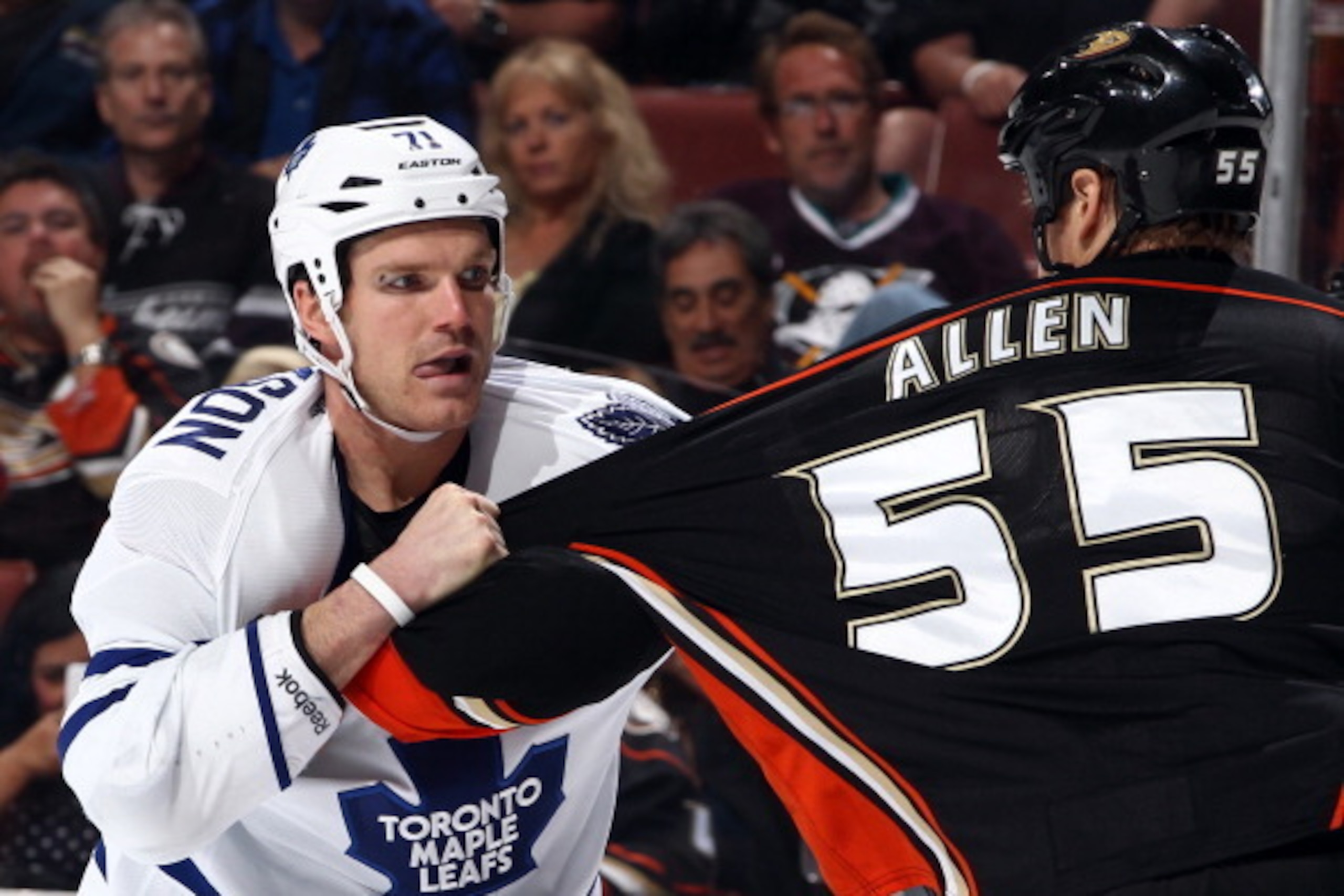 ANAHEIM, CA - MARCH 10:  David Clarkson #71 of the Toronto Maple Leafs mixes it up with Bryan Allen #55 of the Anaheim Ducks on March 10, 2014 at Honda Center in Anaheim, California. (Photo by Debora Robinson/NHLI via Getty Images)
