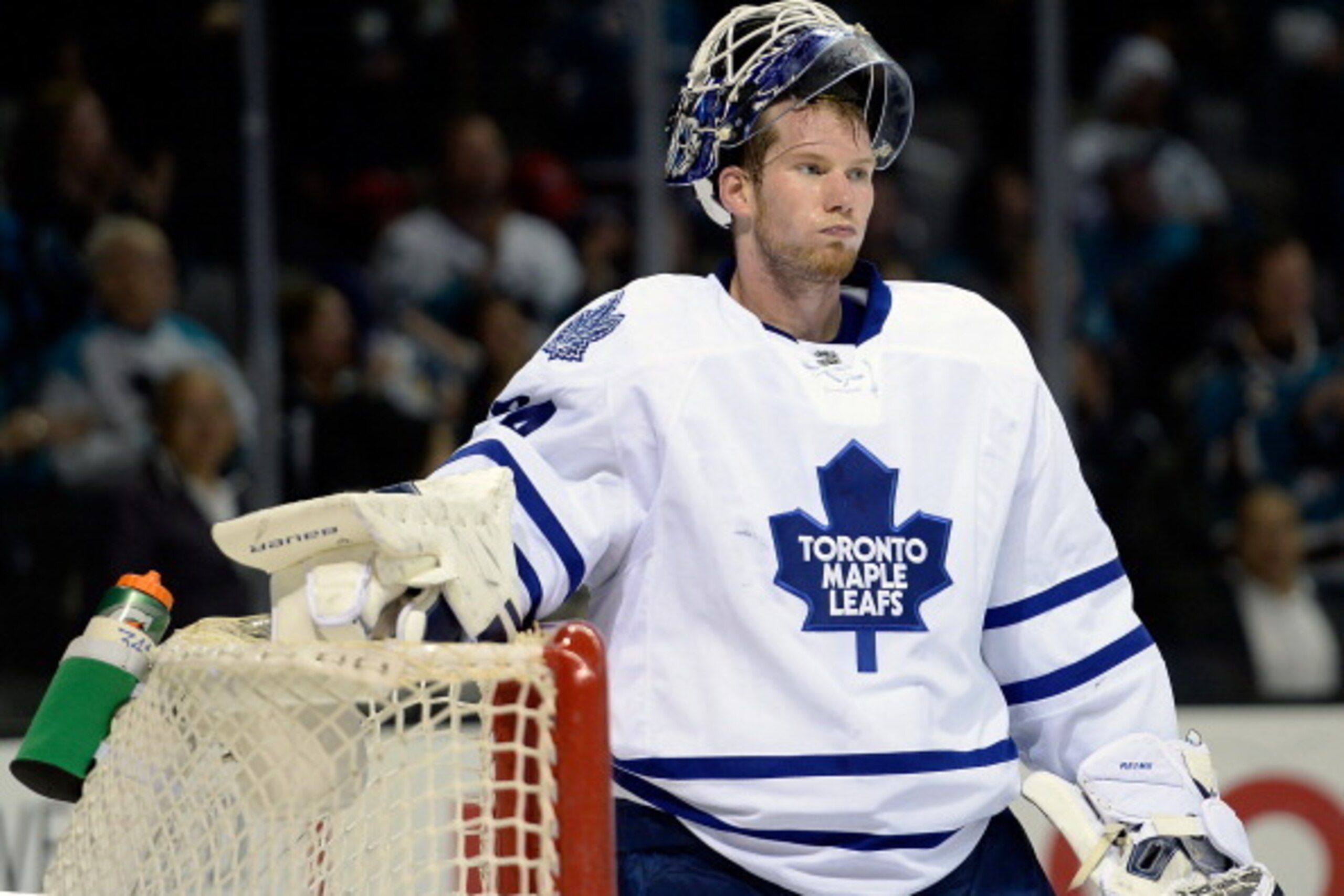 SAN JOSE, CA - MARCH 11:  Goalkeeper James Reimer #34 of the Toronto Maple Leafs looks on after giving up a goal to Tommy Wingles #57 of the San Jose Sharks (not pictured) during the second period at SAP Center on March 11, 2014 in San Jose, California.  