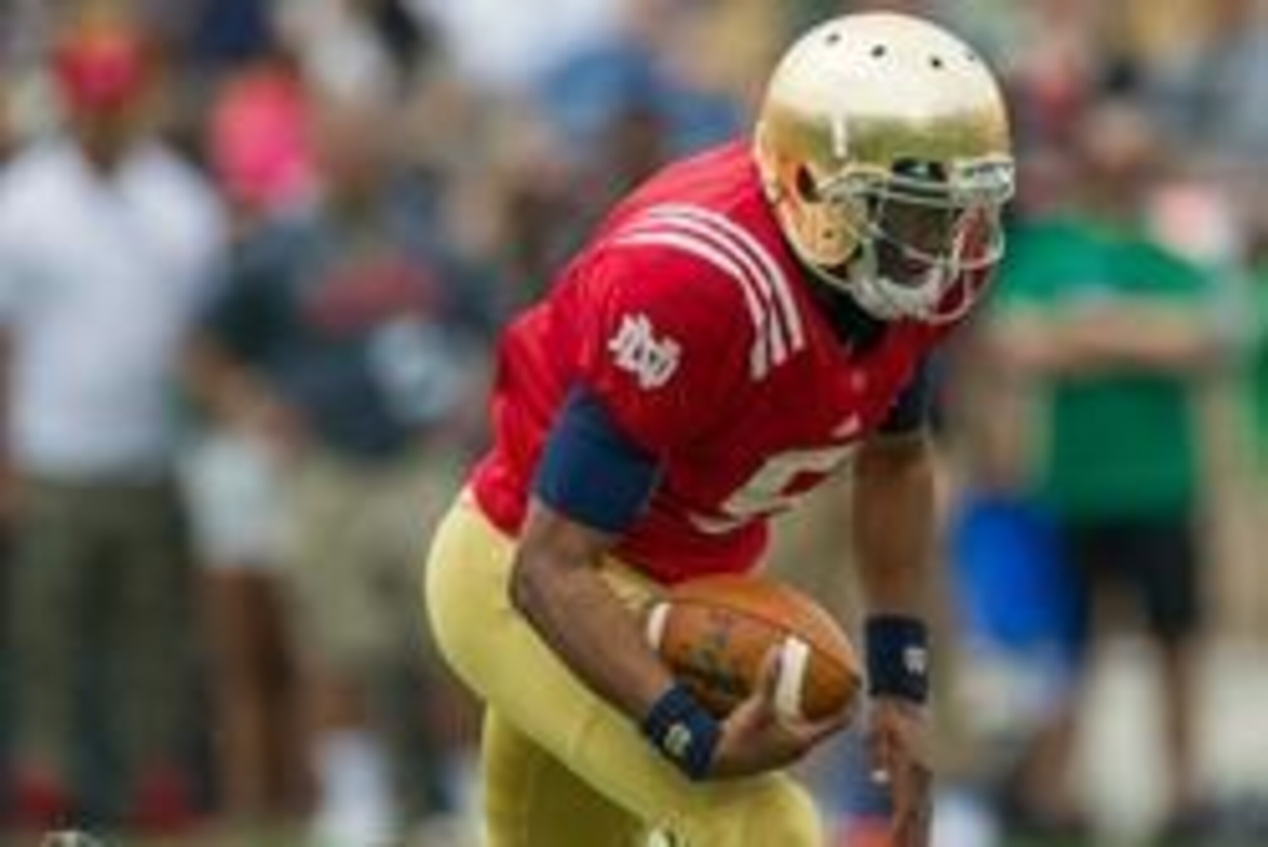 Apr 12, 2014; Notre Dame, IN, USA; Notre Dame Fighting Irish quarterback Everett Golson (5) runs with the ball to score a touchdown in the second quarter of the Blue-Gold game at Notre Dame Stadium. Mandatory Credit: Matt Cashore-USA TODAY Sports
