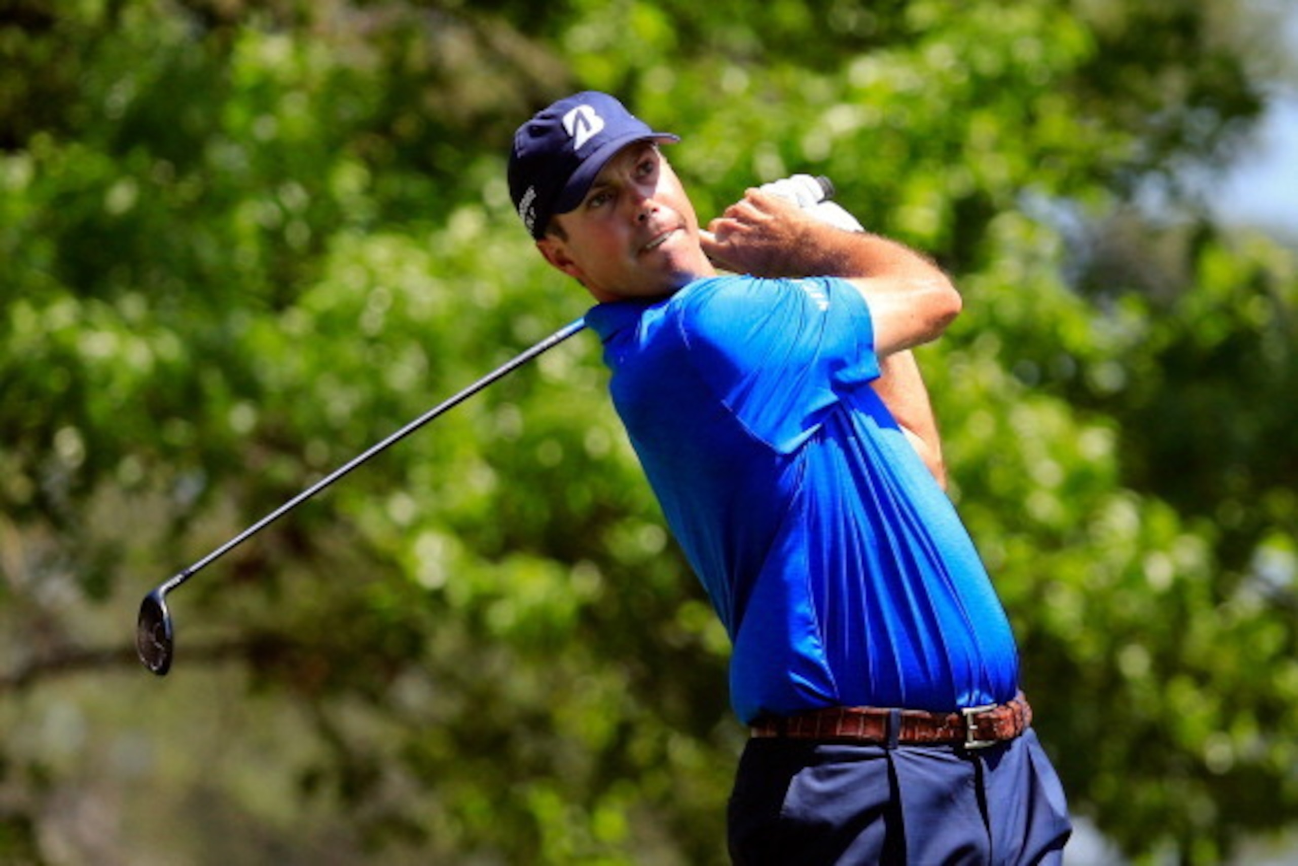 AUGUSTA, GA - APRIL 12: Matt Kuchar of the United States hits his tee shot on the fourth hole during the third round of the 2014 Masters Tournament at Augusta National Golf Club on April 12, 2014 in Augusta, Georgia.  (Photo by Rob Carr/Getty Images)