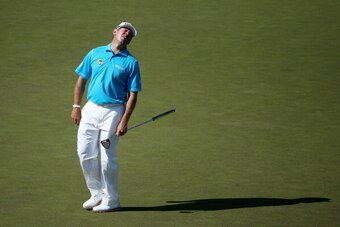AUGUSTA, GA - APRIL 12:  Lee Westwood of England reacts to a missed eagle putt on the 15th green during the third round of the 2014 Masters Tournament at Augusta National Golf Club on April 12, 2014 in Augusta, Georgia.  (Photo by Andrew Redington/Getty I