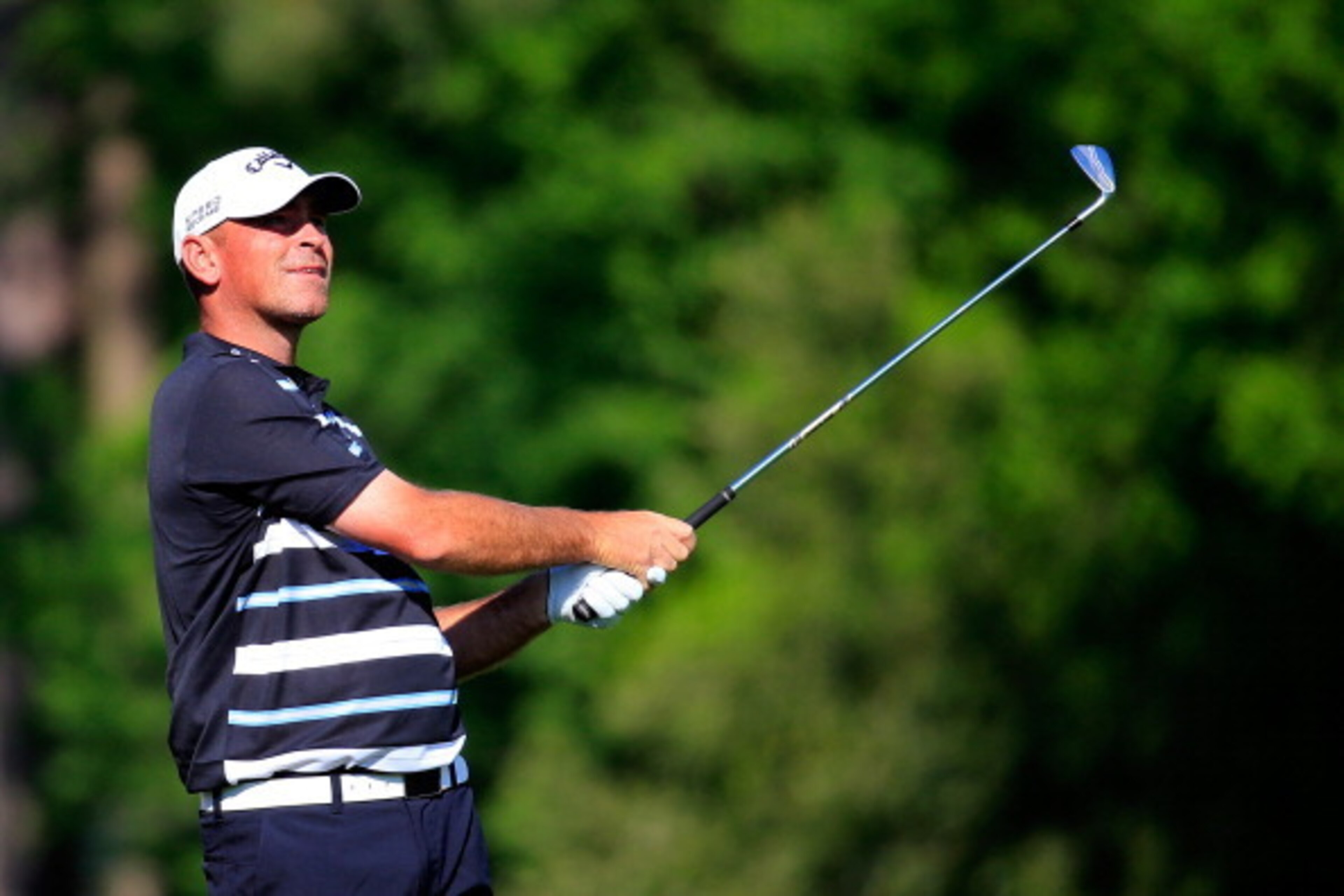 AUGUSTA, GA - APRIL 12:  Thomas Bjorn of Denmark watches his tee shot on the 12th hole during the third round of the 2014 Masters Tournament at Augusta National Golf Club on April 12, 2014 in Augusta, Georgia.  (Photo by Rob Carr/Getty Images)