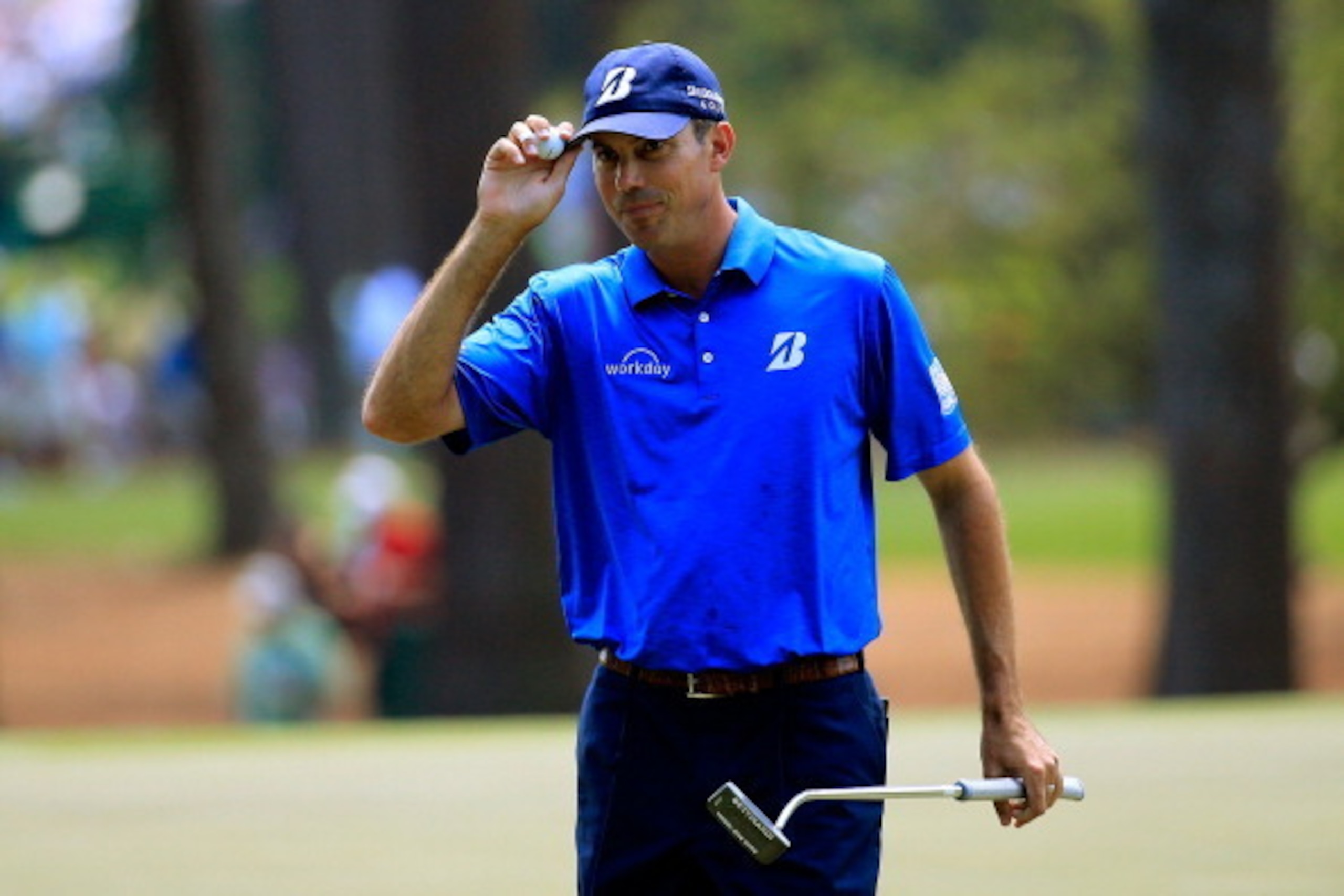 AUGUSTA, GA - APRIL 12:  Matt Kuchar of the United States waves after making a putt for birdie on the third hole during the third round of the 2014 Masters Tournament at Augusta National Golf Club on April 12, 2014 in Augusta, Georgia.  (Photo by Rob Carr