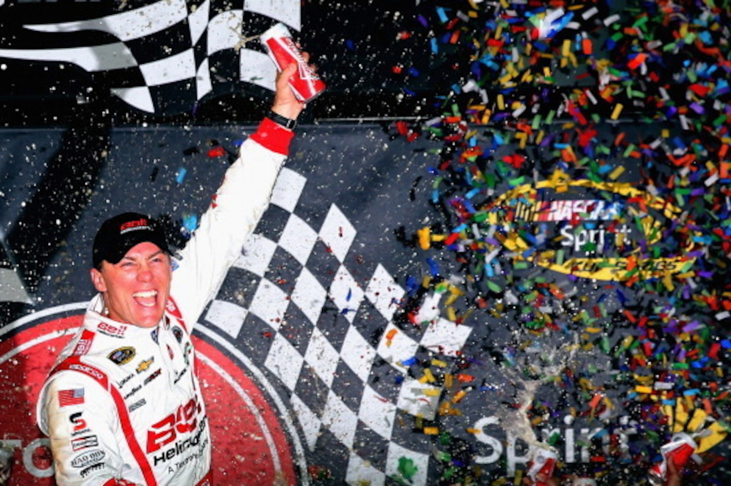 RICHMOND, VA - APRIL 27:  Kevin Harvick, driver of the #29 Bell Helicopter Chevrolet, celebrates in Victory Lane after winning the NASCAR Sprint Cup Series Toyota Owners 400 at Richmond International Raceway on April 27, 2013 in Richmond, Virginia.  (Phot