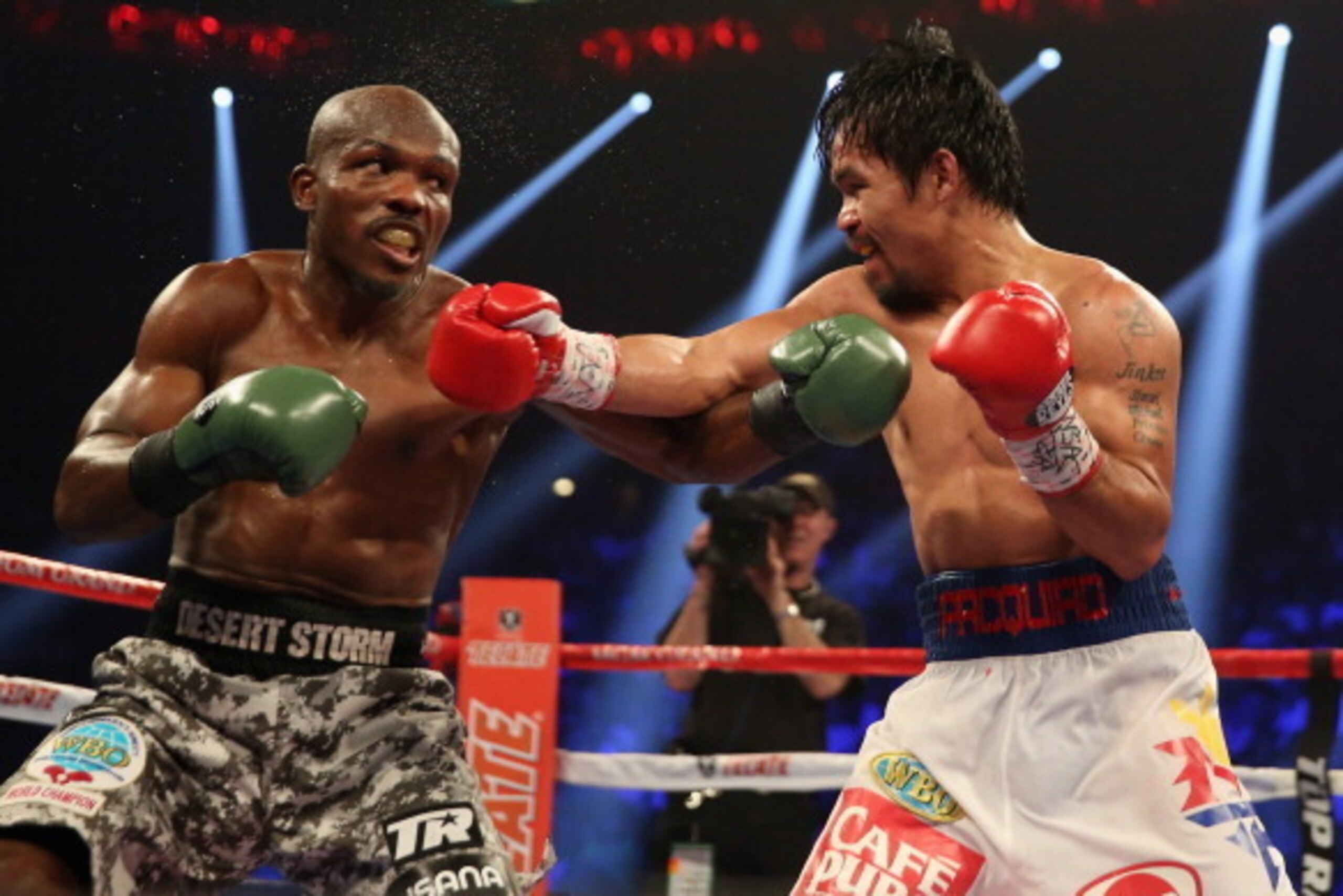 LAS VEGAS, NV - APRIL 12: Manny Pacquiao lands a right hand to the head of Timothy Bradley at the MGM Grand Garden Arena on April 12, 2014 in Las Vegas, Nevada. (Photo by Jeff Gross/Getty Images) LAS VEGAS, NV - APRIL 12: Manny Pacquiao lands a right hand to the head of Timothy Bradley at the MGM Grand Garden Arena on April 12, 2014 in Las Vegas, Nevada. (Photo by Jeff Gross/Getty Images)