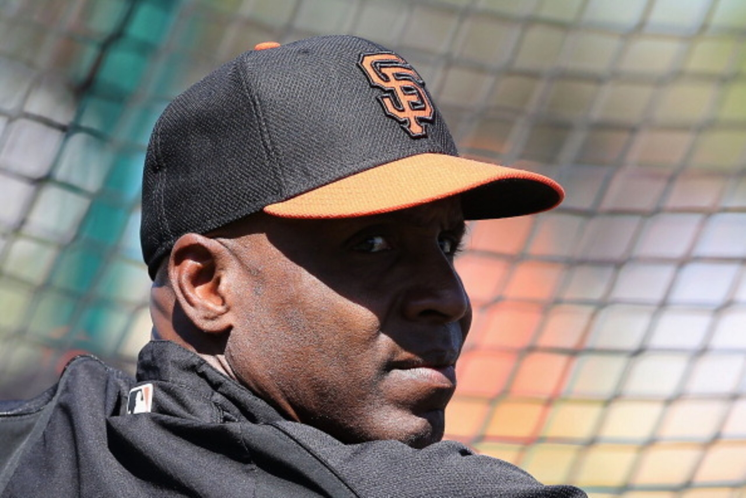 SCOTTSDALE, AZ - MARCH 15:  Barry Bonds of the San Francisco Giants watches batting practice before the spring training game against the Oakland Athletics at Scottsdale Stadium on March 15, 2014 in Scottsdale, Arizona.  (Photo by Christian Petersen/Getty 
