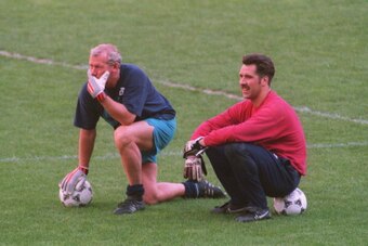 9 MAY 1995:  ARSENAL GOALKEEPER DAVID SEAMAN WITH FORMER KEEPER BOB WILSON (LEFT) IN THOUGHTFUL MOOD DURING THE OFFICIAL ARSENAL TRAINING SESSION AT THE PARC DES PRINCES STADIUM IN PARIS PRIOR TO THE EUROPEAN CUP WINNERS CUP FINAL MATCH AGAINST REAL ZARAG