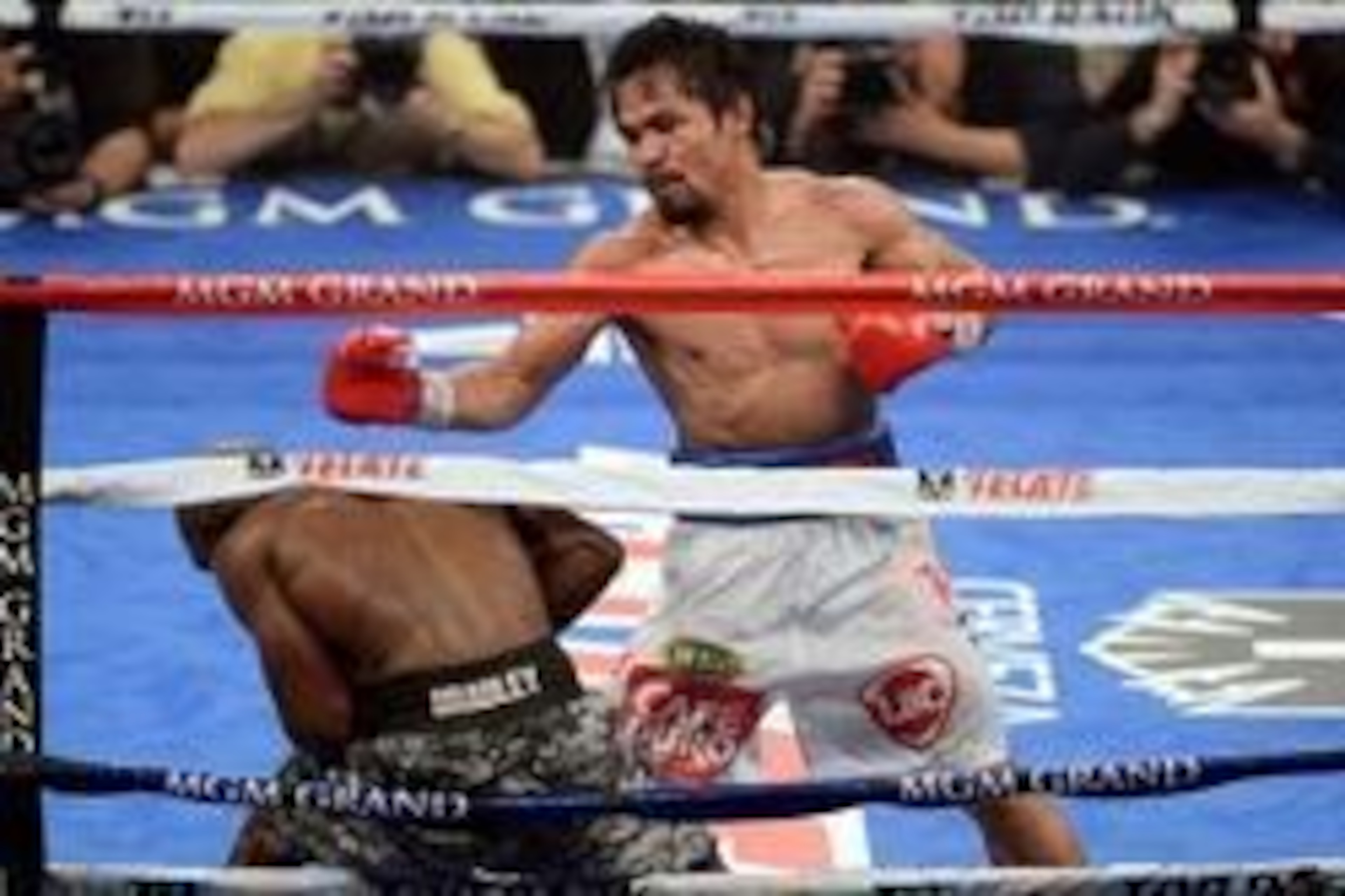 Apr 12, 2014; Las Vegas, NV, USA; Timothy Bradley (green gloves) and Manny Pacquiao (red gloves) box during their WBO World Welterweight Title bout at MGM Grand Garden Arena. Pacquiao won via unanimous decision. Mandatory Credit: Joe Camporeale-USA TODAY Apr 12, 2014; Las Vegas, NV, USA; Timothy Bradley (green gloves) and Manny Pacquiao (red gloves) box during their WBO World Welterweight Title bout at MGM Grand Garden Arena. Pacquiao won via unanimous decision. Mandatory Credit: Joe Camporeale-USA TODAY