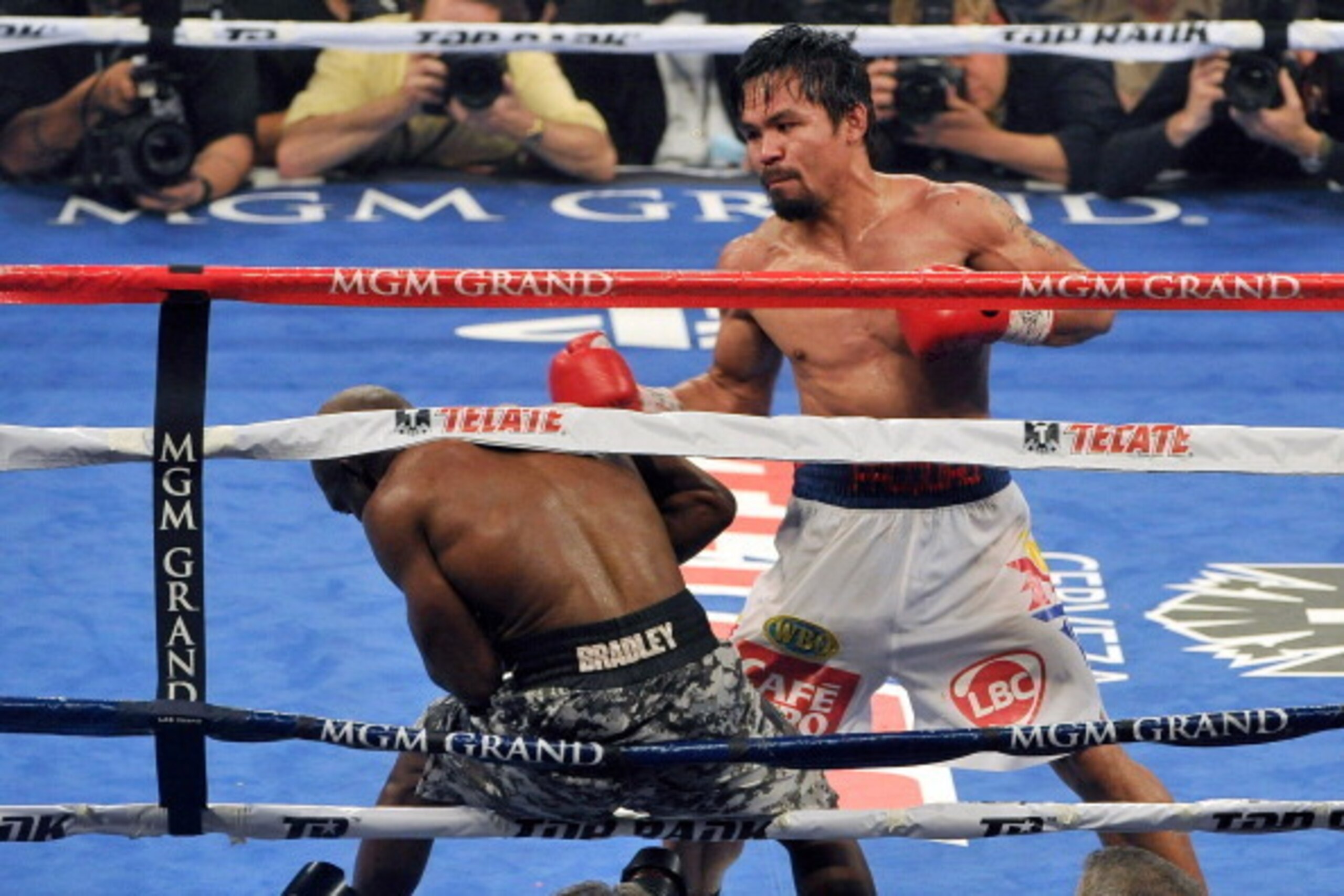 LAS VEGAS, NV - APRIL 12:  Manny Pacquiao (R) pushes Timothy Bradley on the ropes during their WBO world welterweight championship boxing match at the MGM Grand Garden Arena on April 12, 2014 in Las Vegas, Nevada. Pacquiao won by unanimous decision.  (Pho