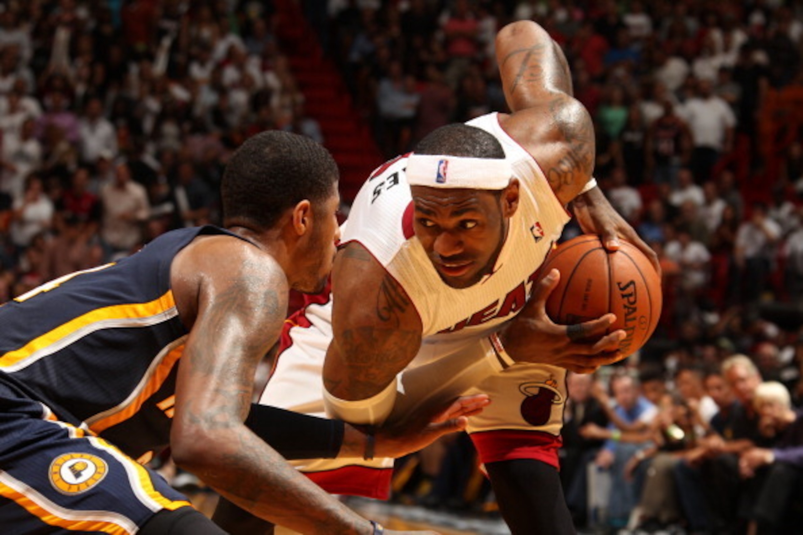 MIAMI, FL - April 11: LeBron James #6 of the Miami Heat handles the ball against the Indiana Pacers at the American Airlines Arena in Miami, Florida on April 11, 2014. NOTE TO USER: User expressly acknowledges and agrees that, by downloading and/or using 